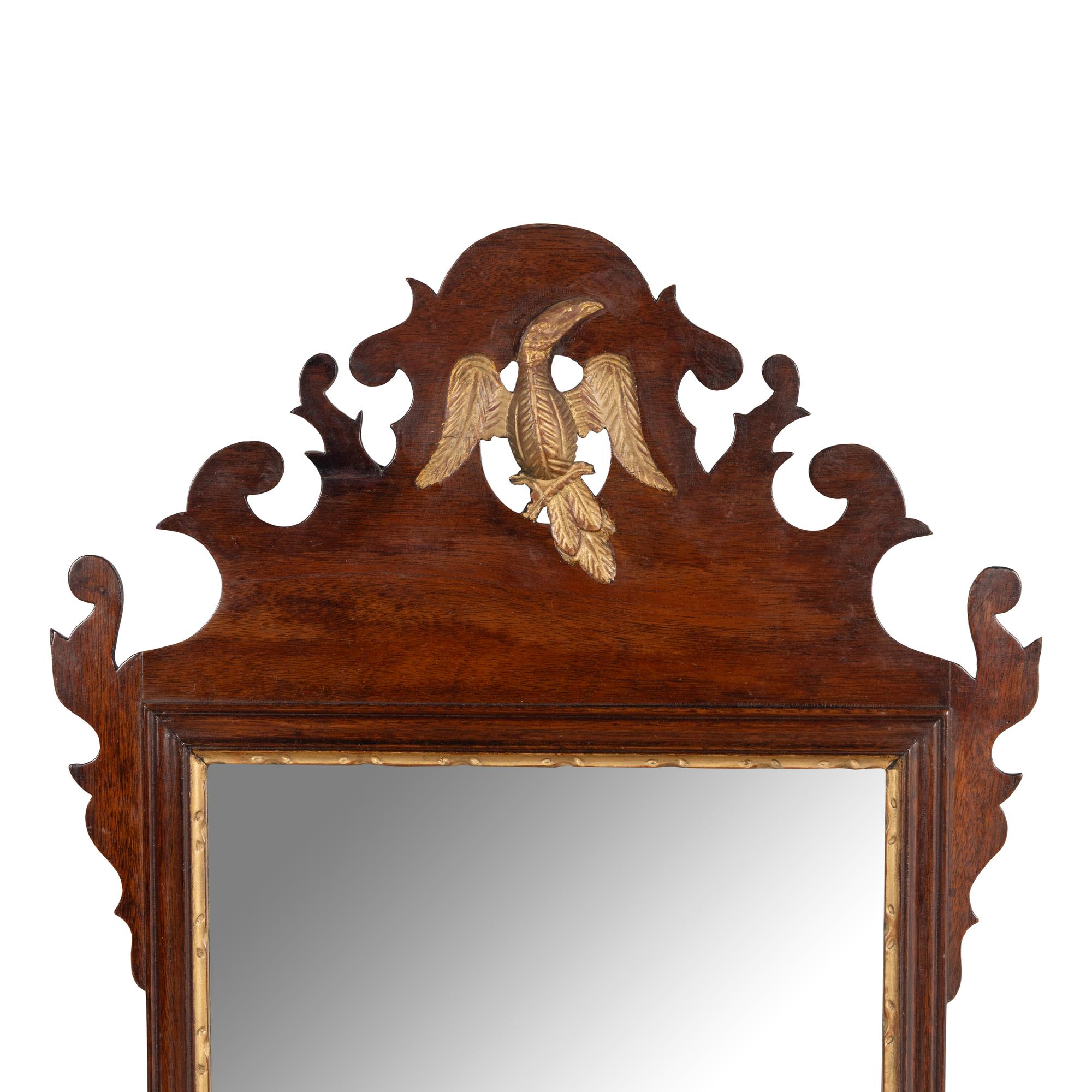 A George III Style Parcel-Gilt Mahogany Mirror