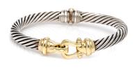 A Sterling Silver and 14 Karat Yellow Gold 'Buckle' Bracelet, David Yurman, 36.00 dwts.