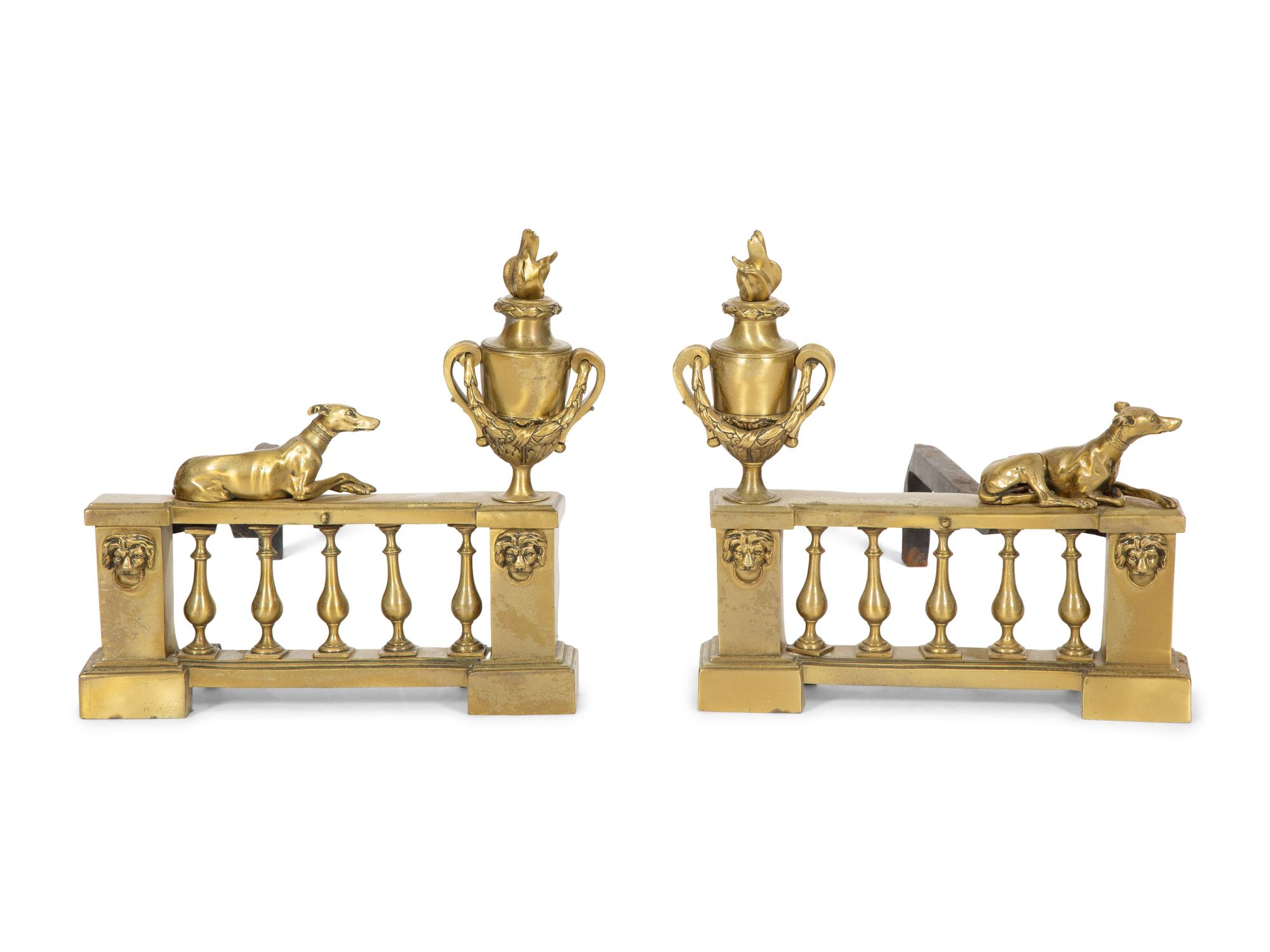 A Pair of French Brass Chenets with Recumbent Dogs
