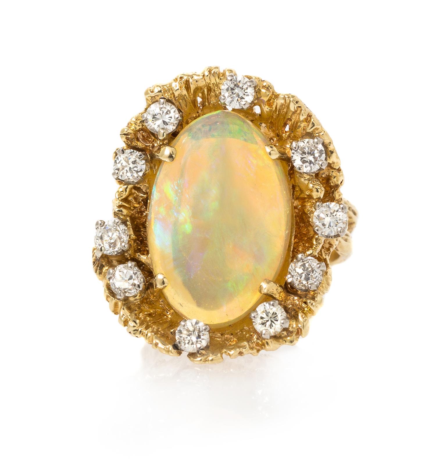 A 14 Karat Yellow Gold Opal and Diamond Ring, 9.80 dwts.