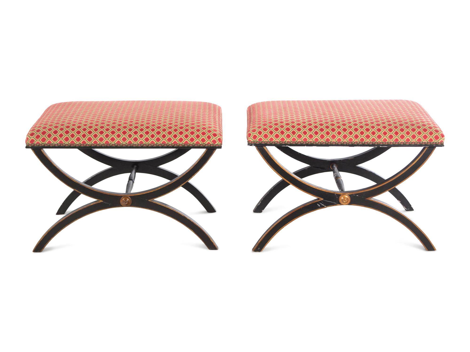 A Pair of Black Painted and Parcel Gilt Curule Benches