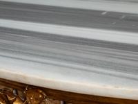 A Pair of Italian Neoclassical Style White Painted and Parcel Gilt Marble-Top Console Tables