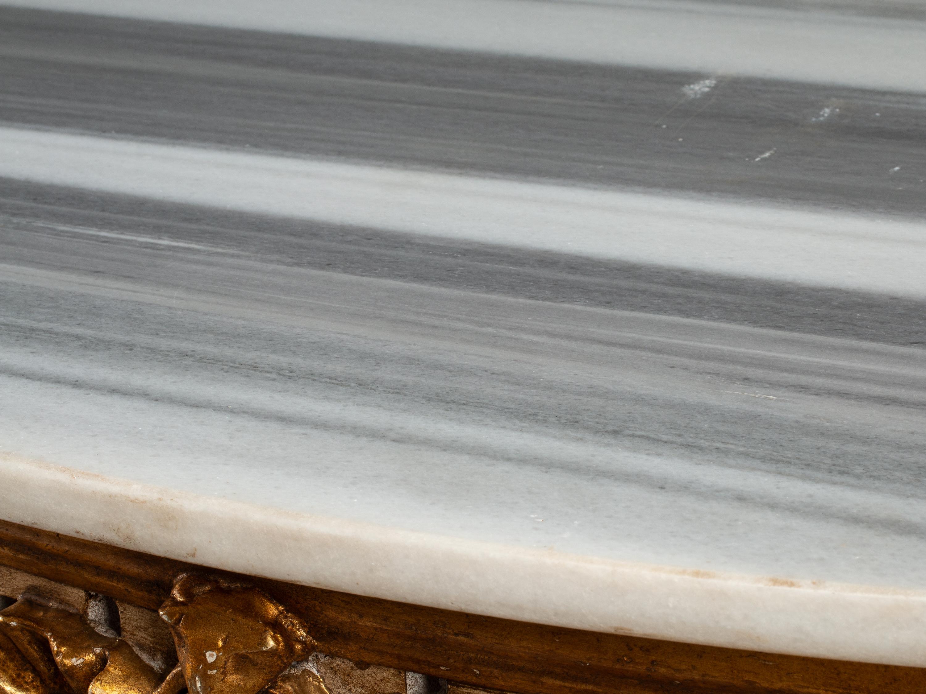 A Pair of Italian Neoclassical Style White Painted and Parcel Gilt Marble-Top Console Tables