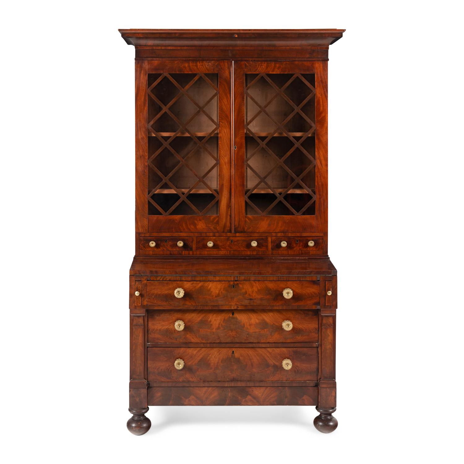 A Classical Mahogany Desk and Bookcase