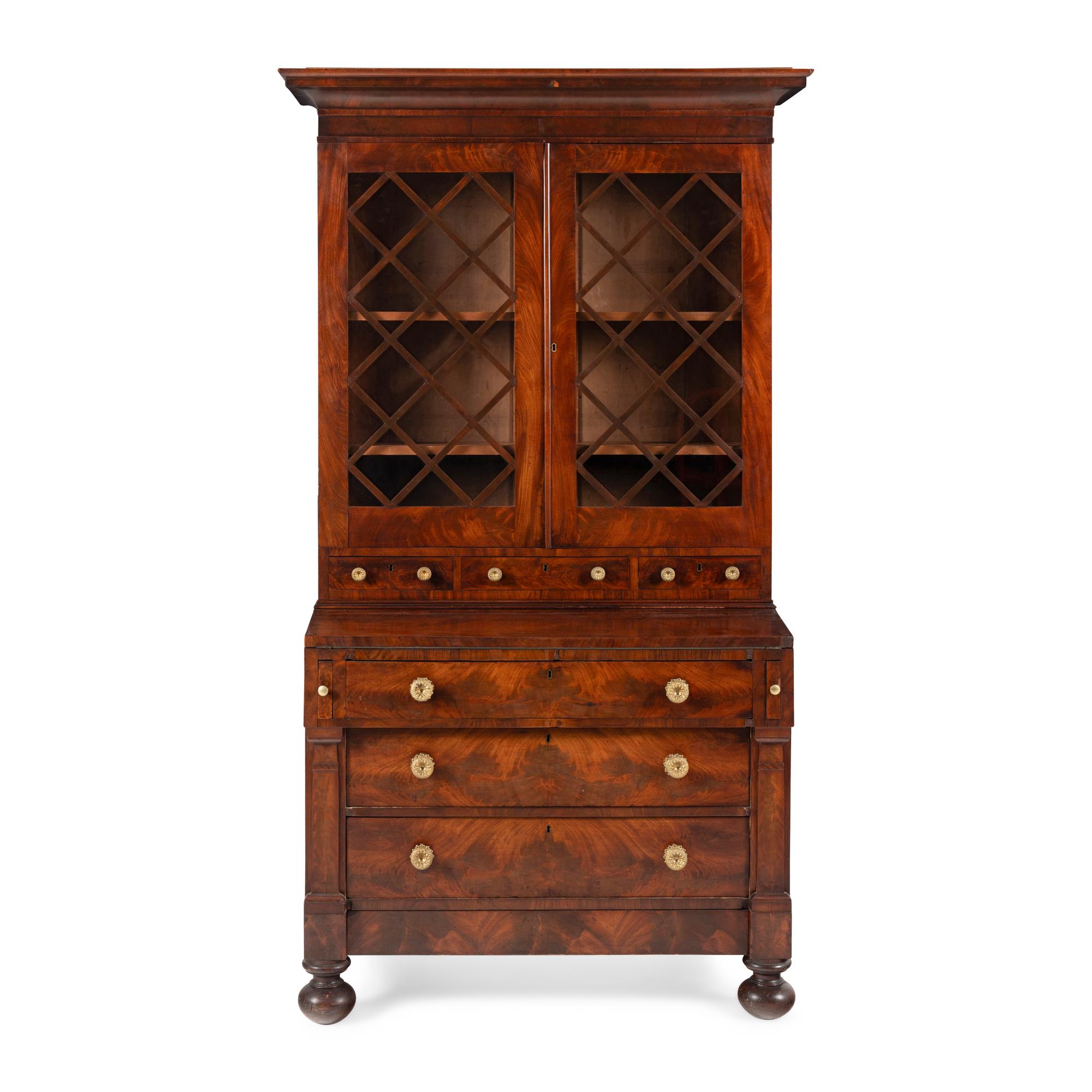 A Classical Mahogany Desk and Bookcase