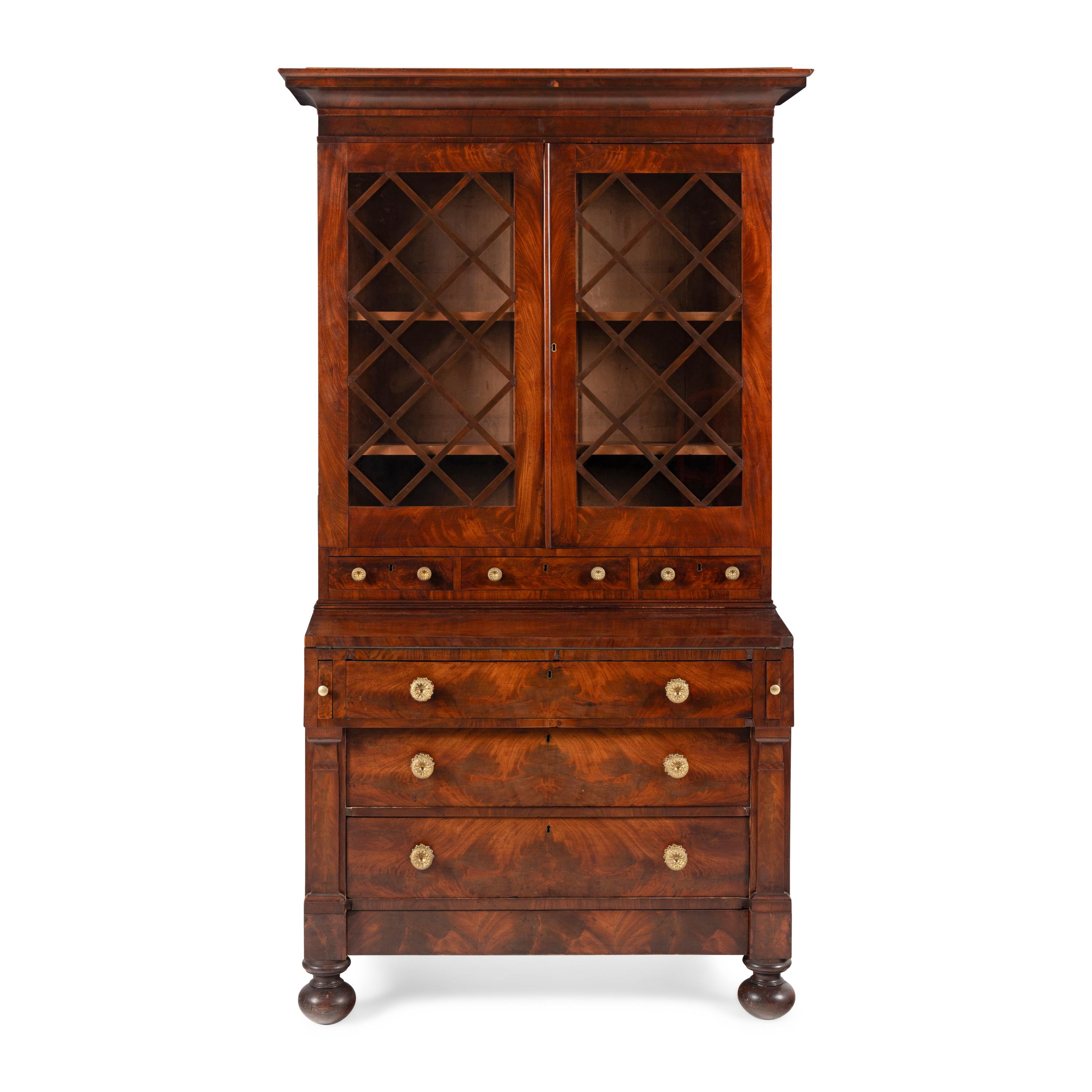 A Classical Mahogany Desk and Bookcase