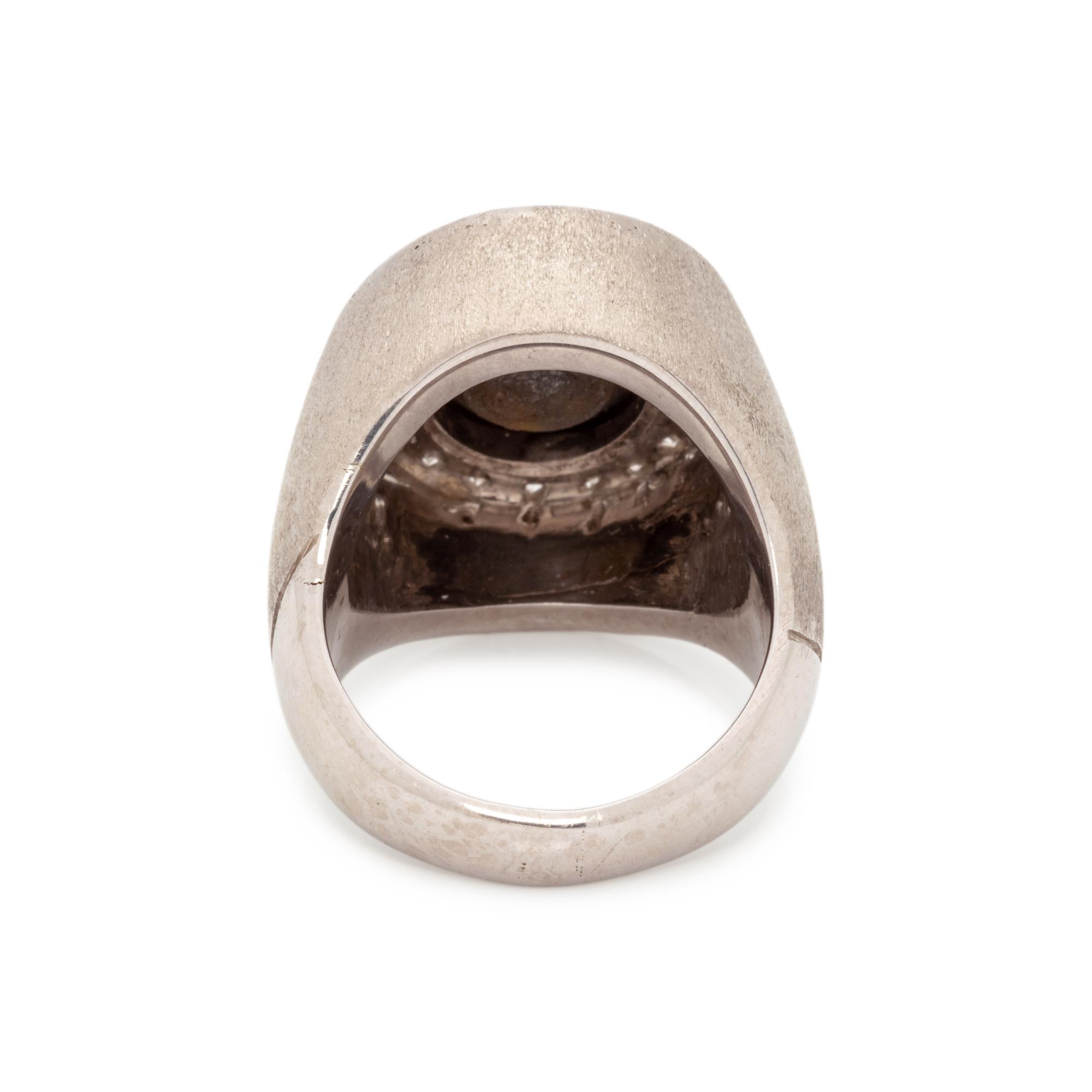 BLACK STAR SAPPHIRE AND DIAMOND RING