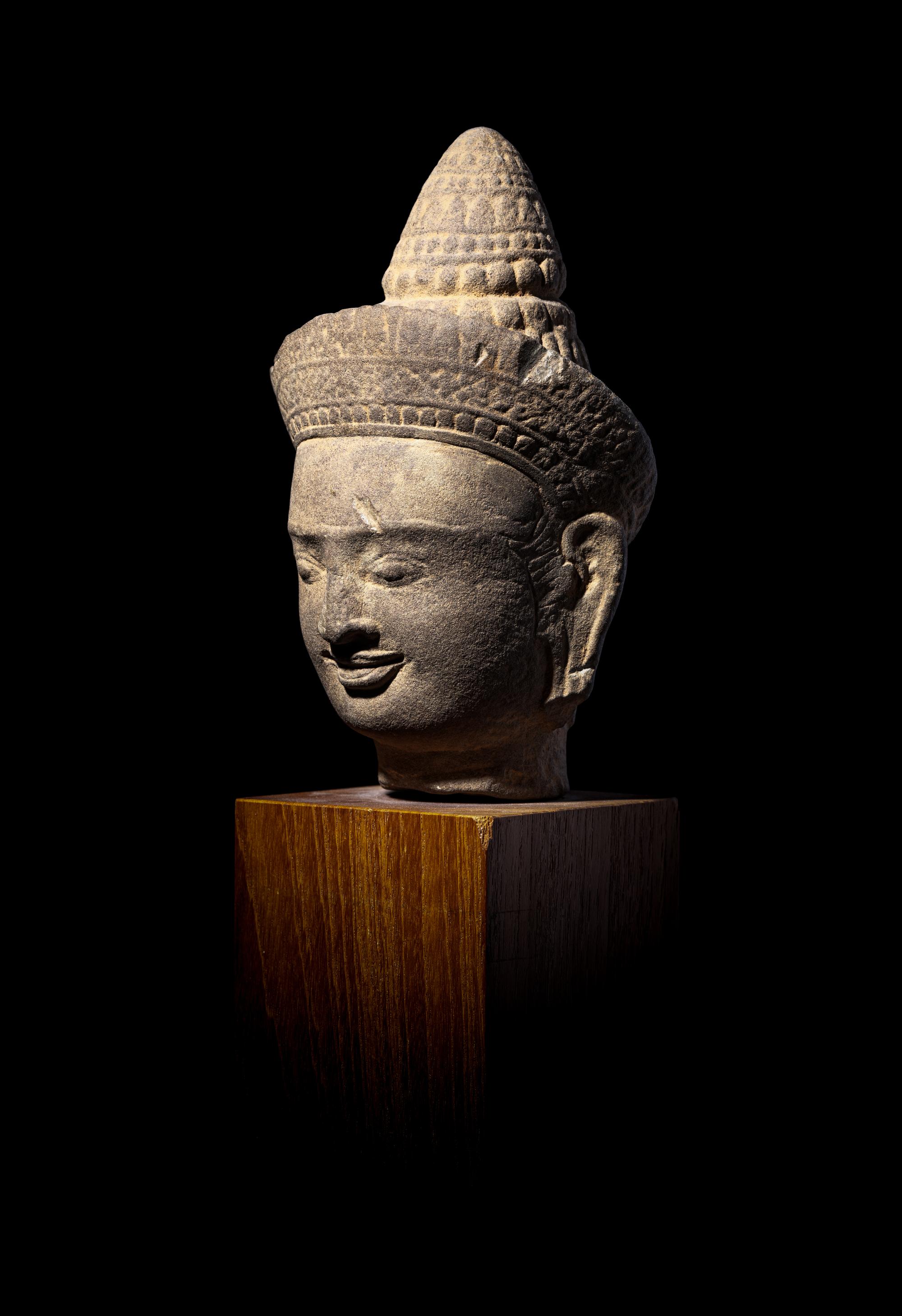A Khmer Sandstone Head of a Deity