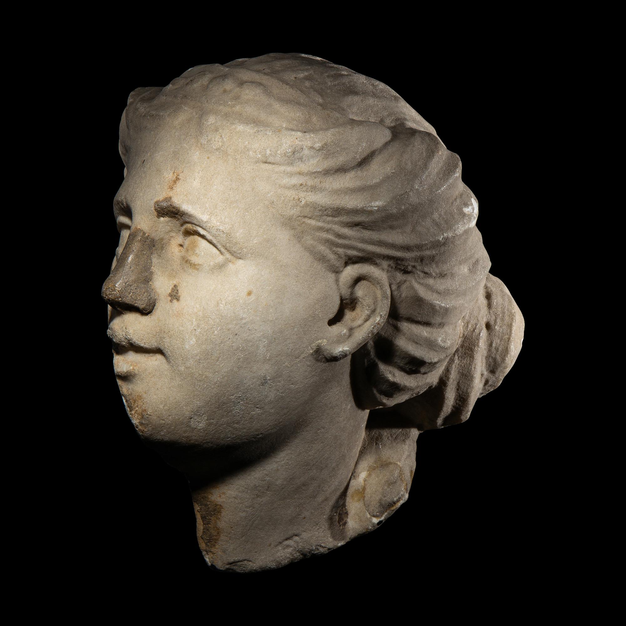 A Roman Marble Head of a Goddess
