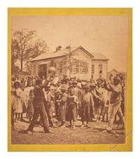 [EARLY PHOTOGRAPHY]. Mounted albumen photograph of African American children playing a game. Ca 1860s.