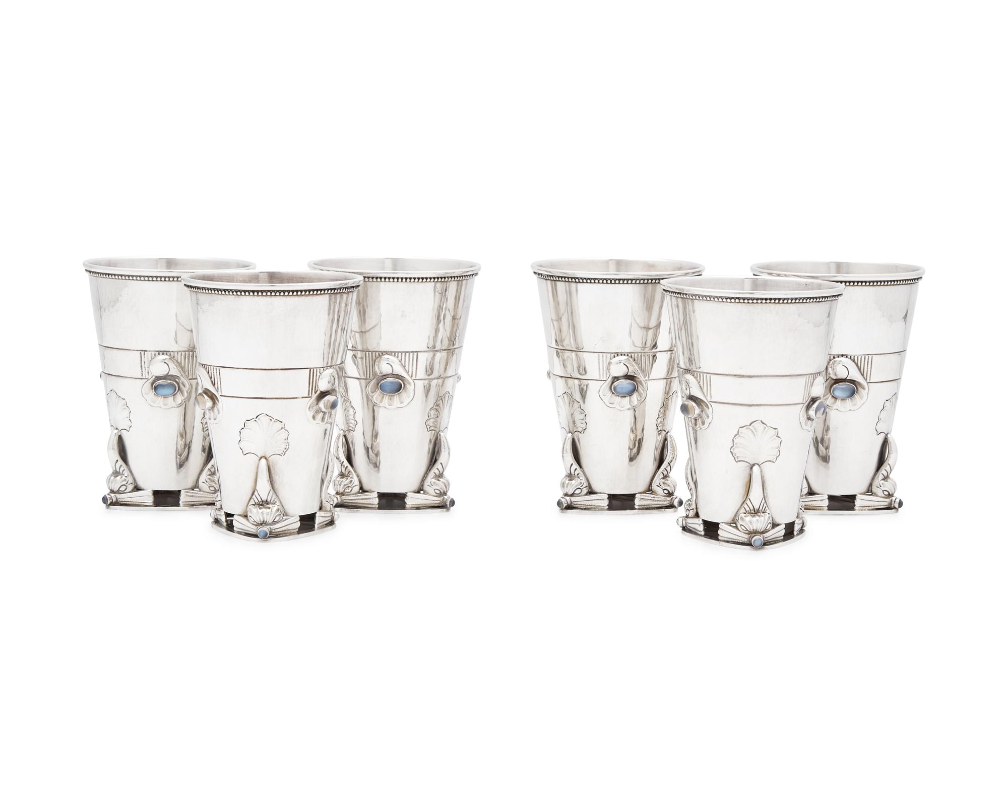 A Set of Six Georg Jensen Silver and Moonstone Mounted Beakers