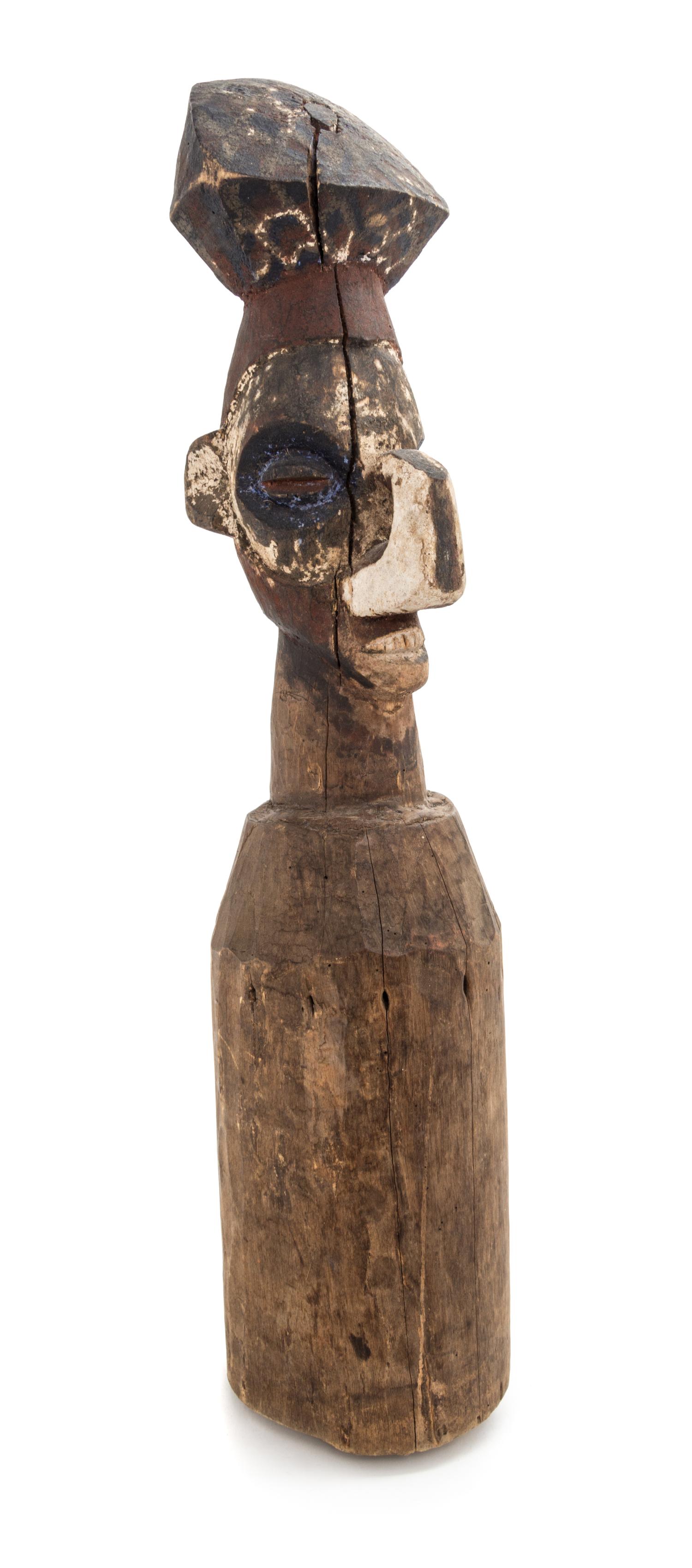 An African Carved Wood Yaka Pounder, Congo Height 23 x diameter 4 1/2 inches.