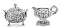 An American Silver Creamer and Covered Sugar, S. Kirk & Son, Baltimore, MD, each worked with repousse floral and foliate decoration, th