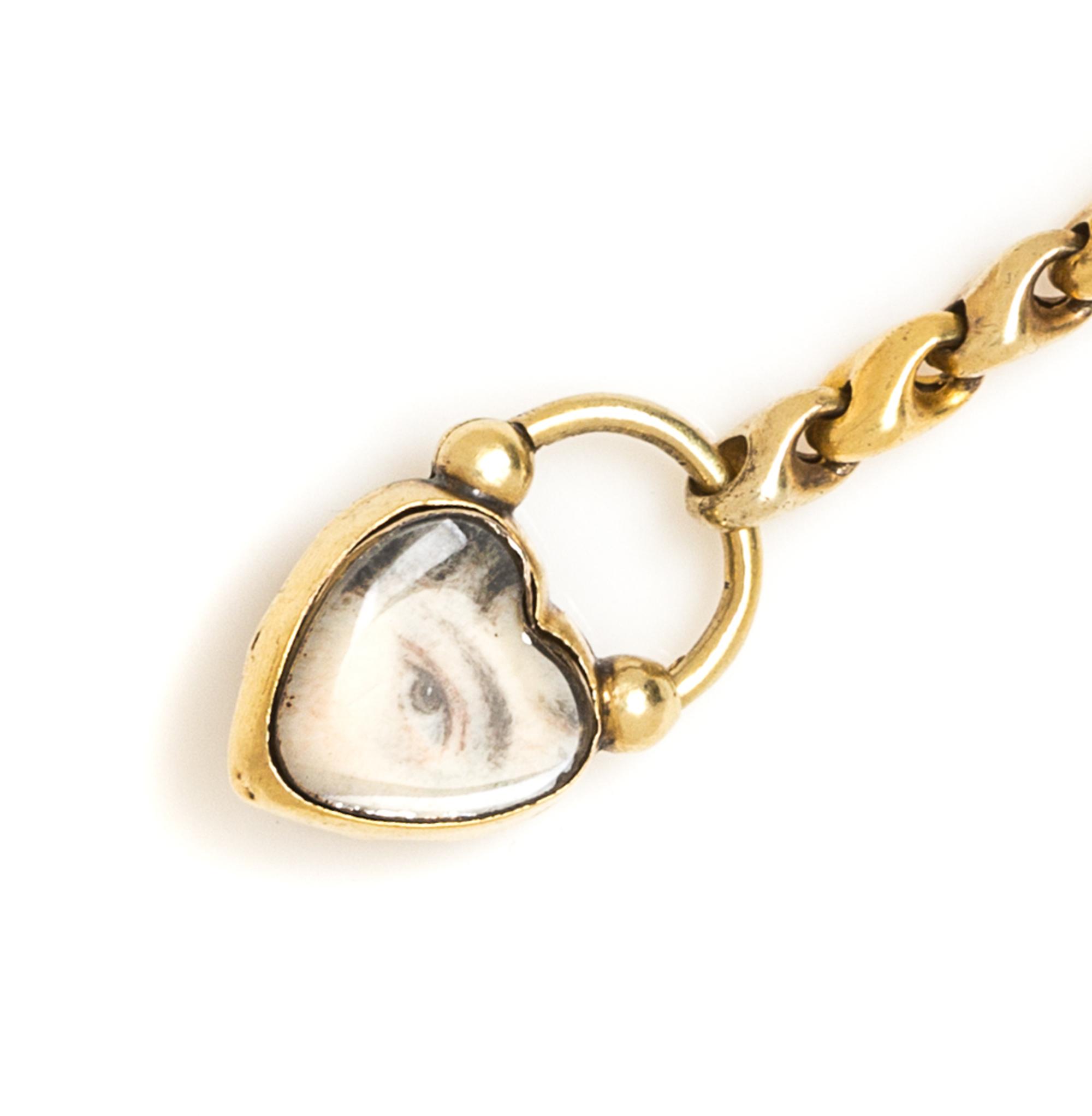 A Georgian Yellow Gold and Garnet Lover's Eye Padlock Charm Bracelet, 6.70 dwts.