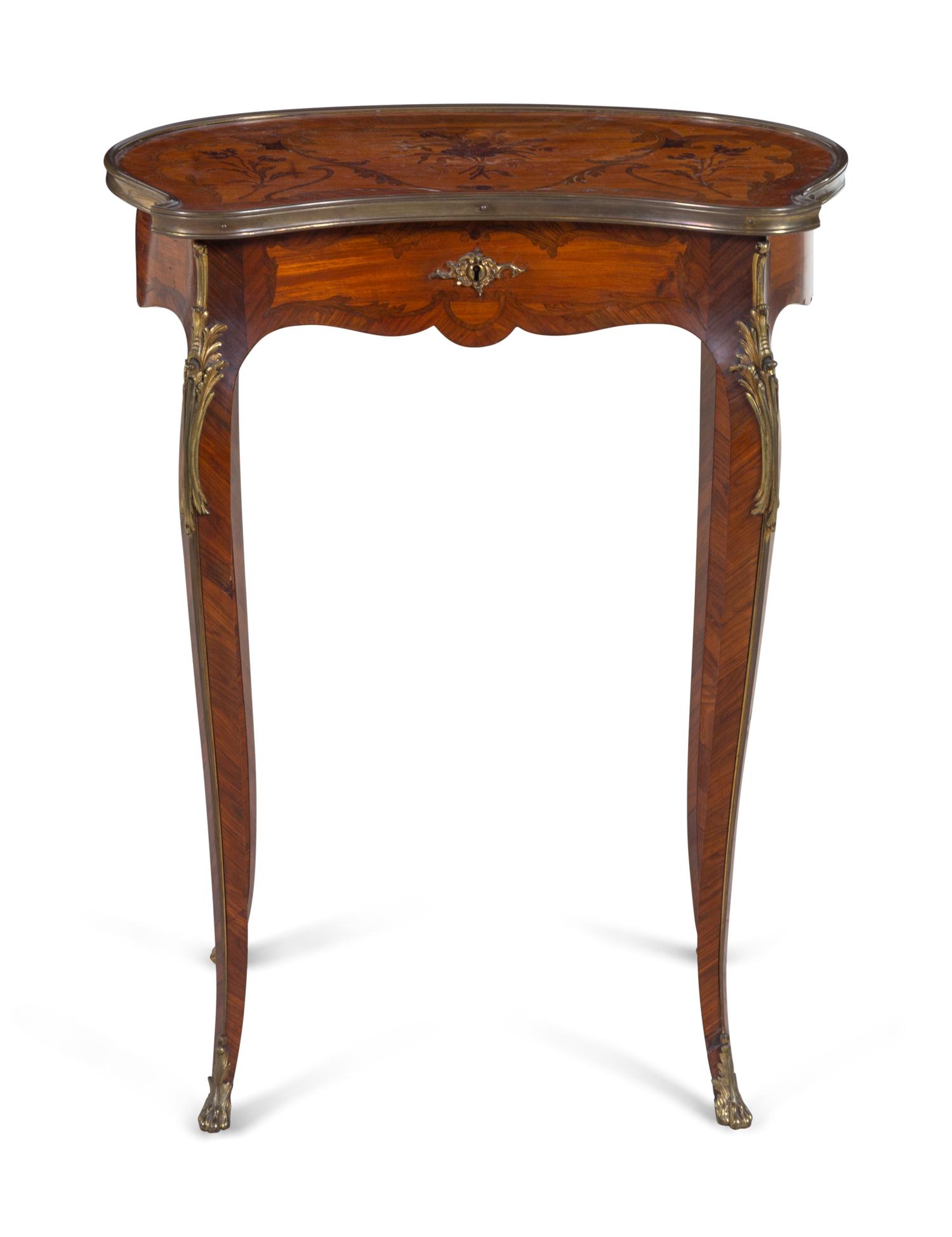 A Louis XV Style Gilt Bronze Mounted Marquetry Table à Ouvrage