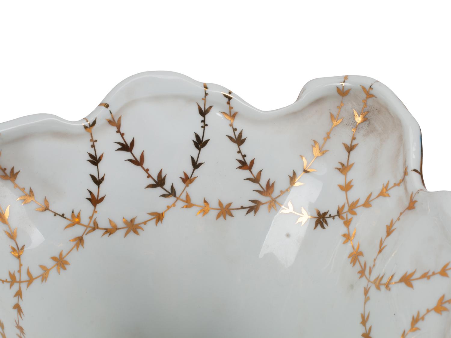 A Pair of Sèvres Style Porcelain Cornucopia Vases