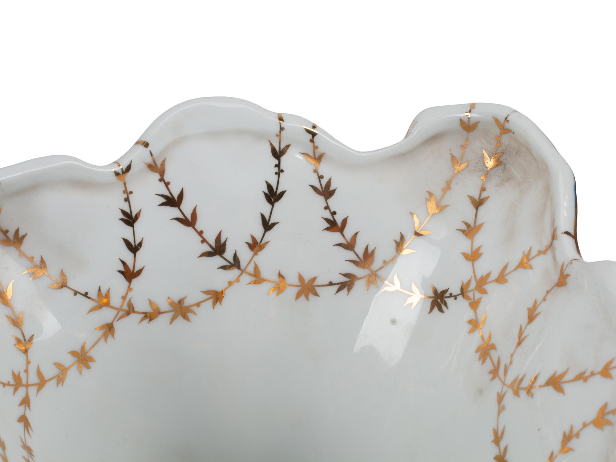 A Pair of Sèvres Style Porcelain Cornucopia Vases