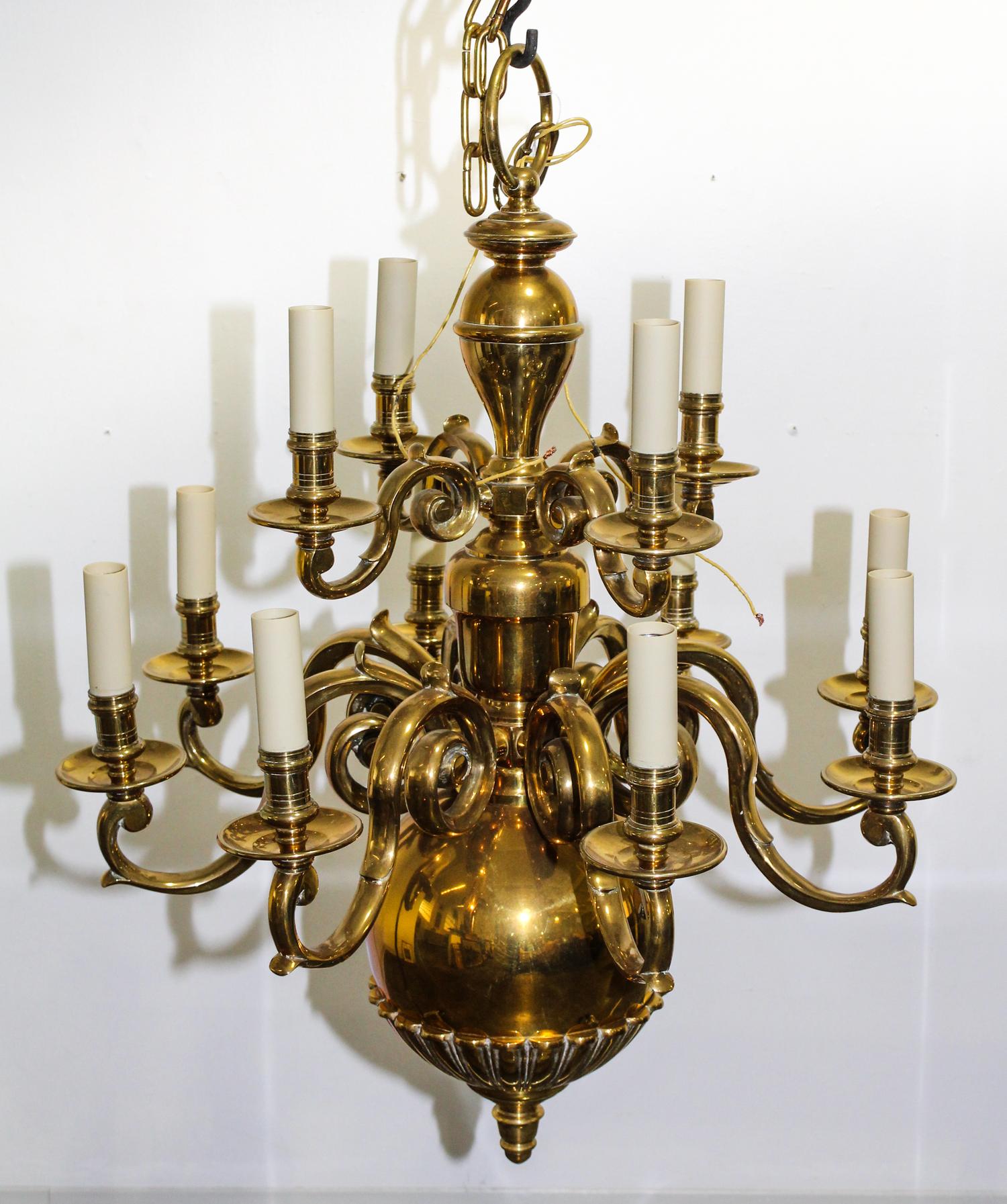 A Dutch Baroque Style Brass Twelve Light Chandelier Diameter 28 3/4 inches.