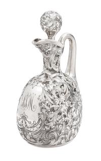 A Silver Overlay Glass Ewer Height 8 3/4 inches.