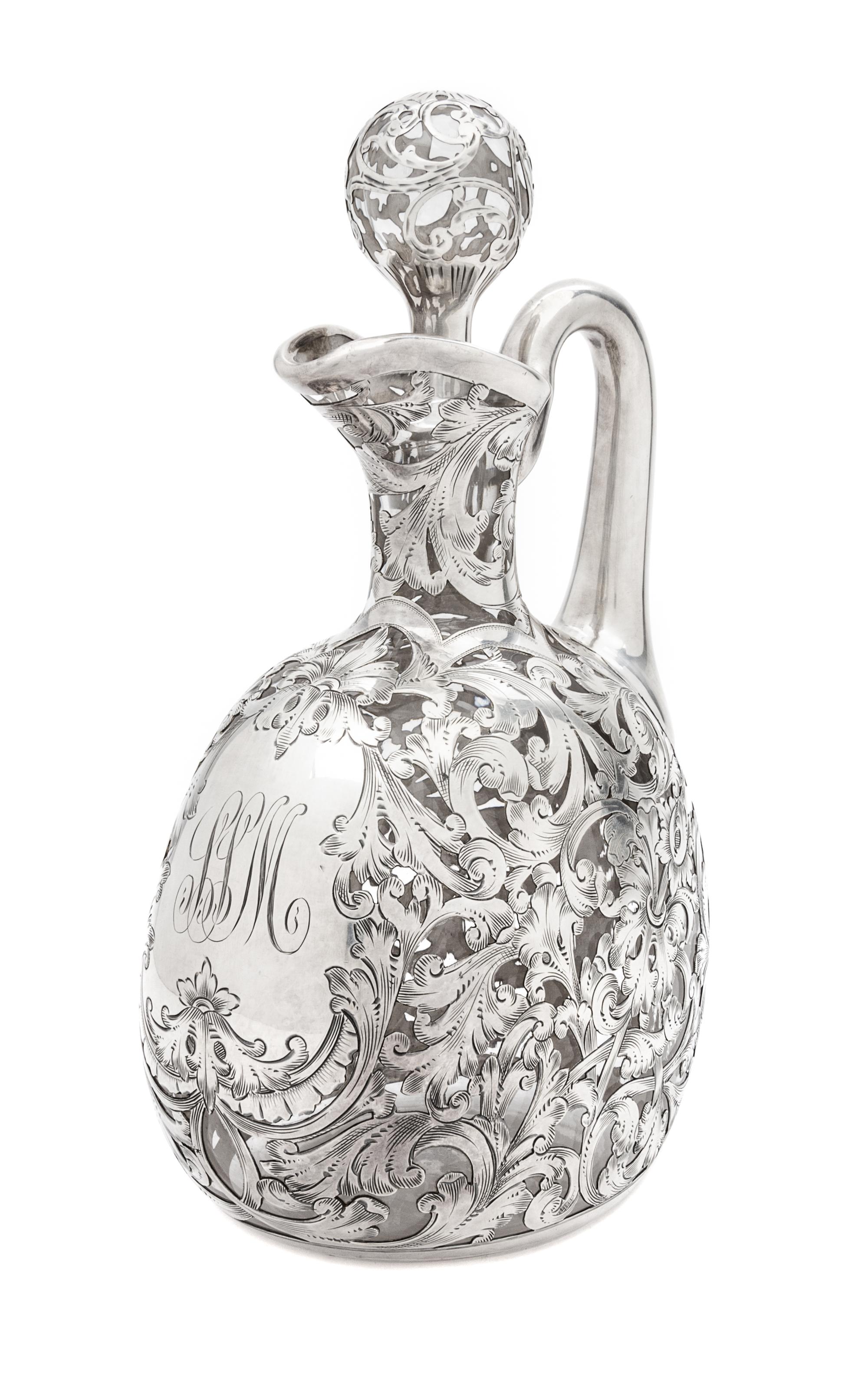 A Silver Overlay Glass Ewer Height 8 3/4 inches.
