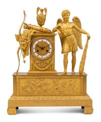 An Empire Gilt Bronze Figural Mantel Clock