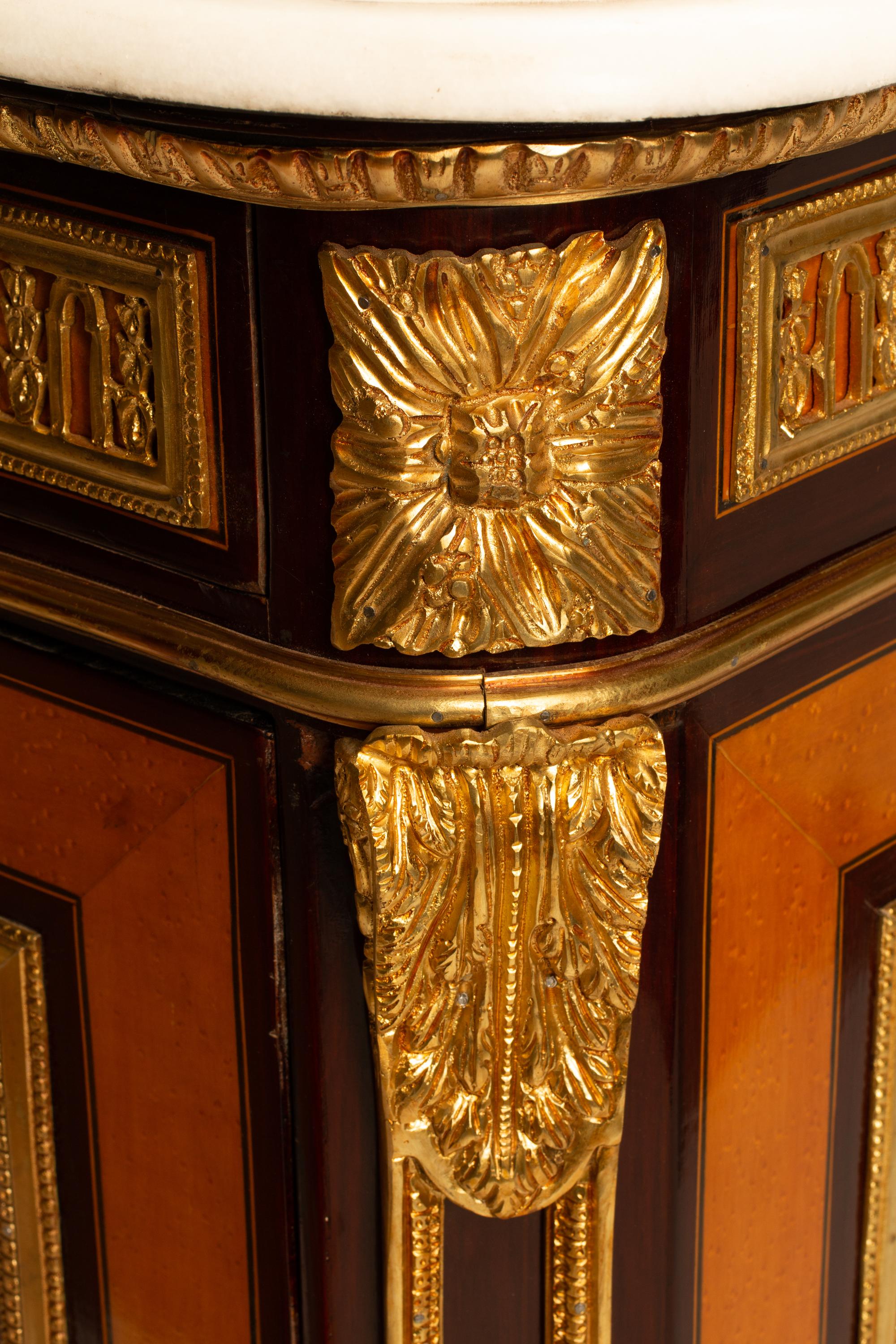 A Regence Style Marquetry Inlaid Gilt Bronze Mounted Marble Top Commode — 19TH CENTURY