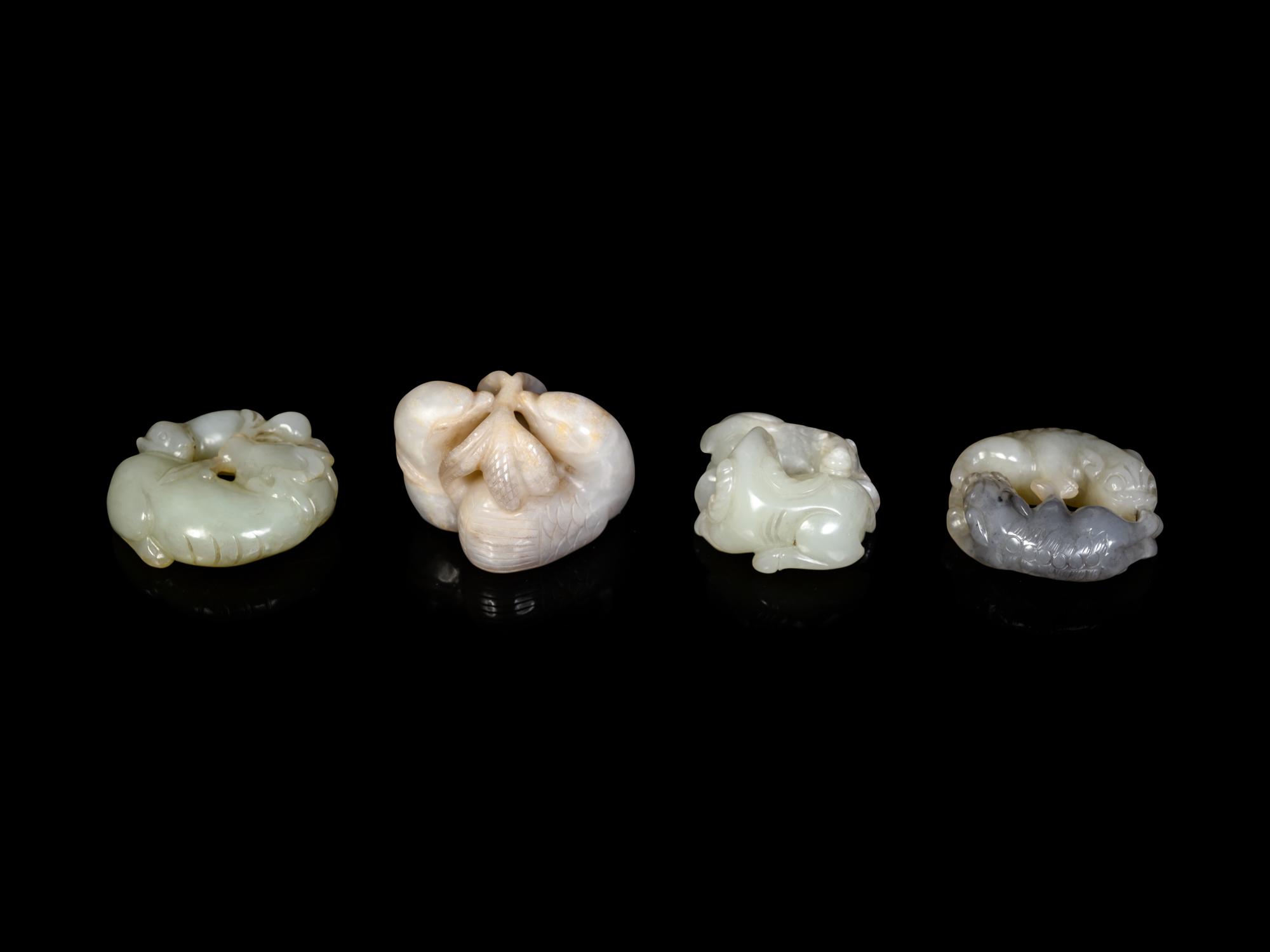 Four Chinese Celadon Jade Carvings of Double Animals