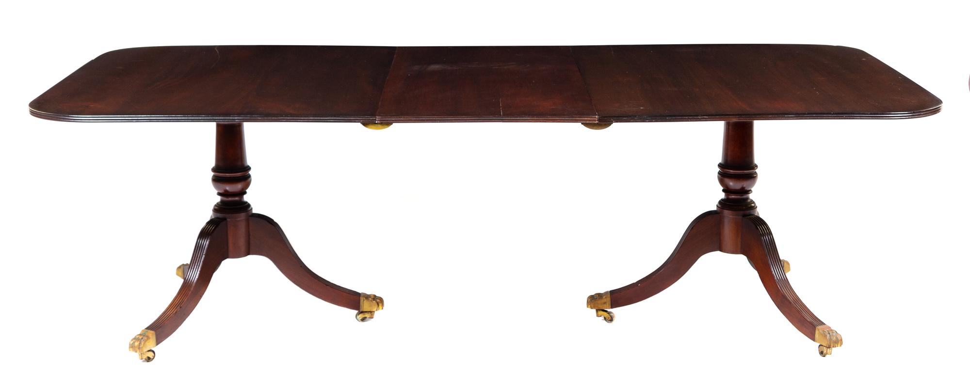 A George III Style Mahogany Double Pedestal Dining Table Height 29 3/4 x length 77 x depth 47 inches. — LATE 19TH/EARLY 20TH CENTURY