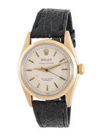 ROLEX, REF. 6634 14K YELLOW GOLD AND STAINLESS STEEL 'OYSTER PERPETUAL' WATCH
