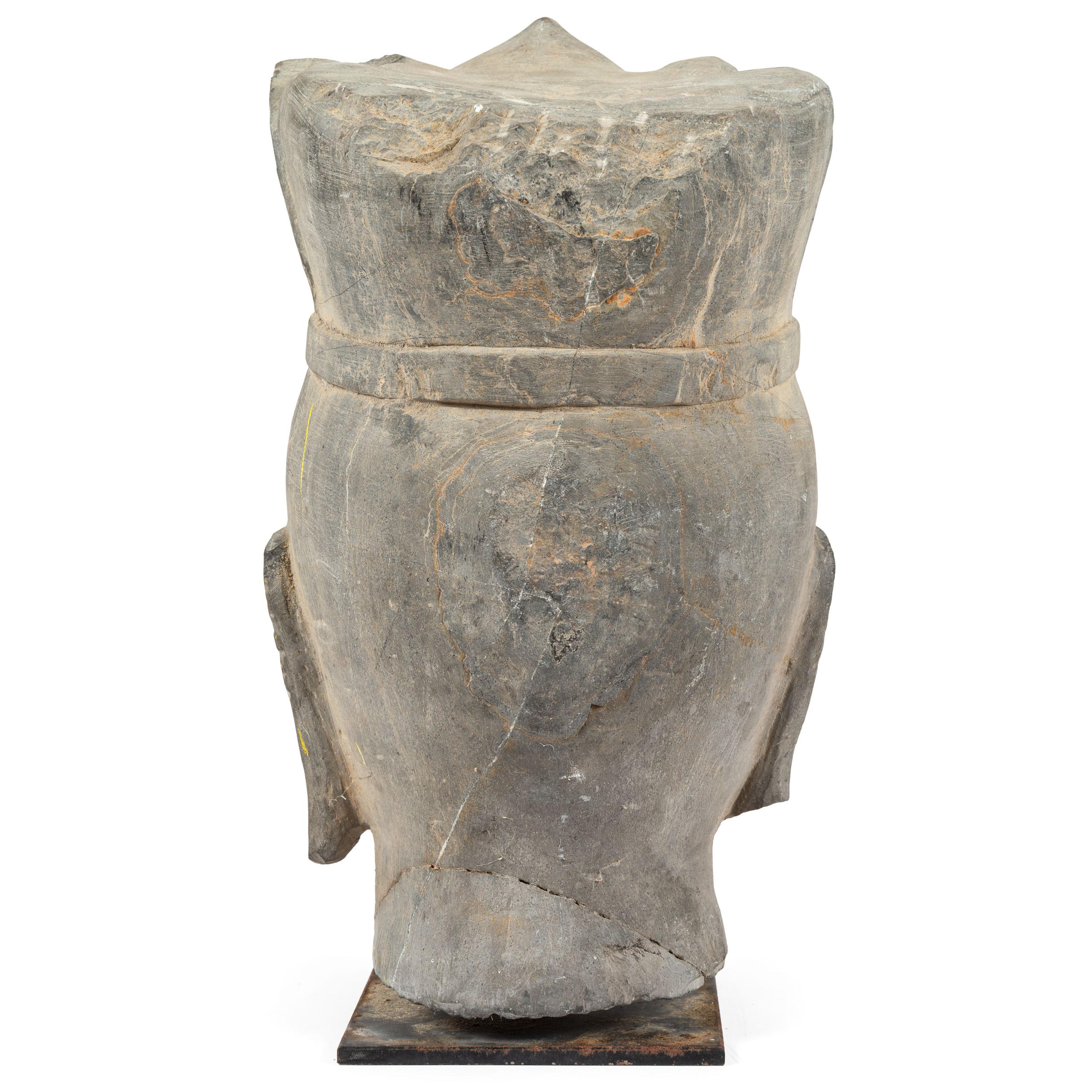 A Carved Stone Buddha Head