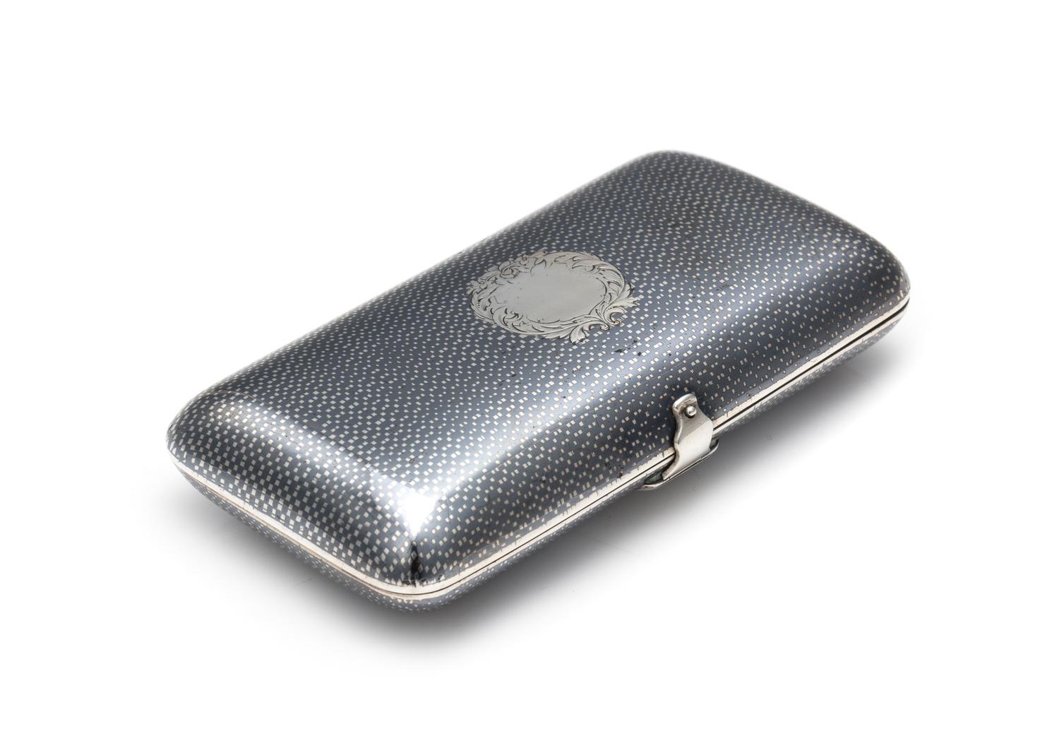 A Russian Niello Silver Cigarette Case, Mark of S. Stroganov, Assay of Viktor Savinsky, Moscow, 1865, the patterned niello decoration w