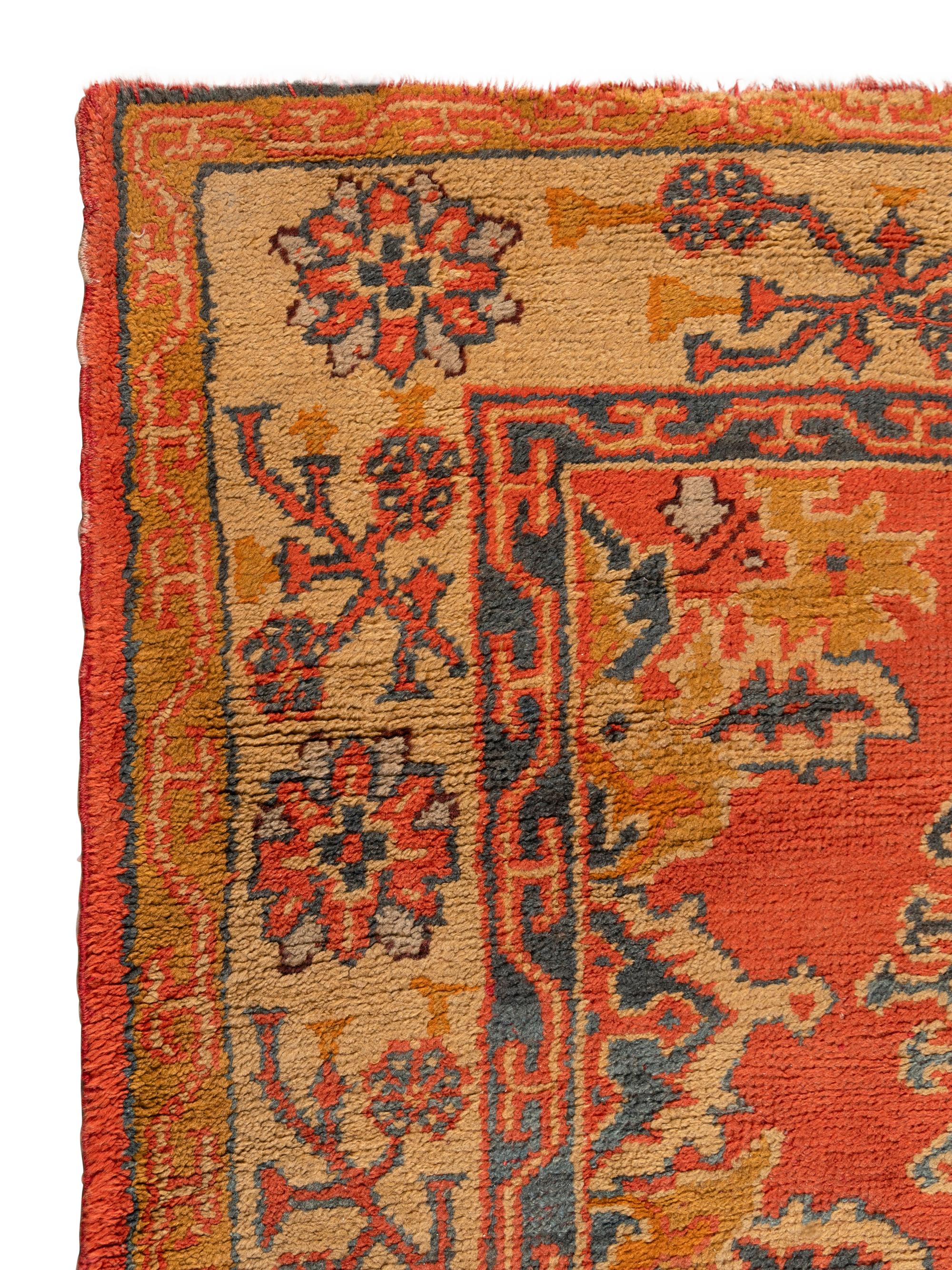 An Oushak Wool Rug