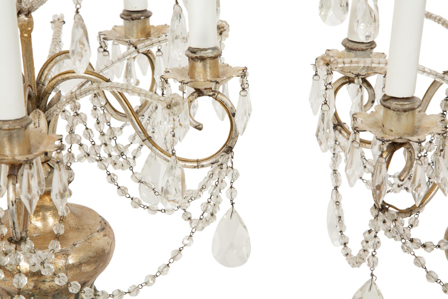 A Pair of Louis XV Style Cut Glass Five-Light Girandoles in Silvered Wood Bases
