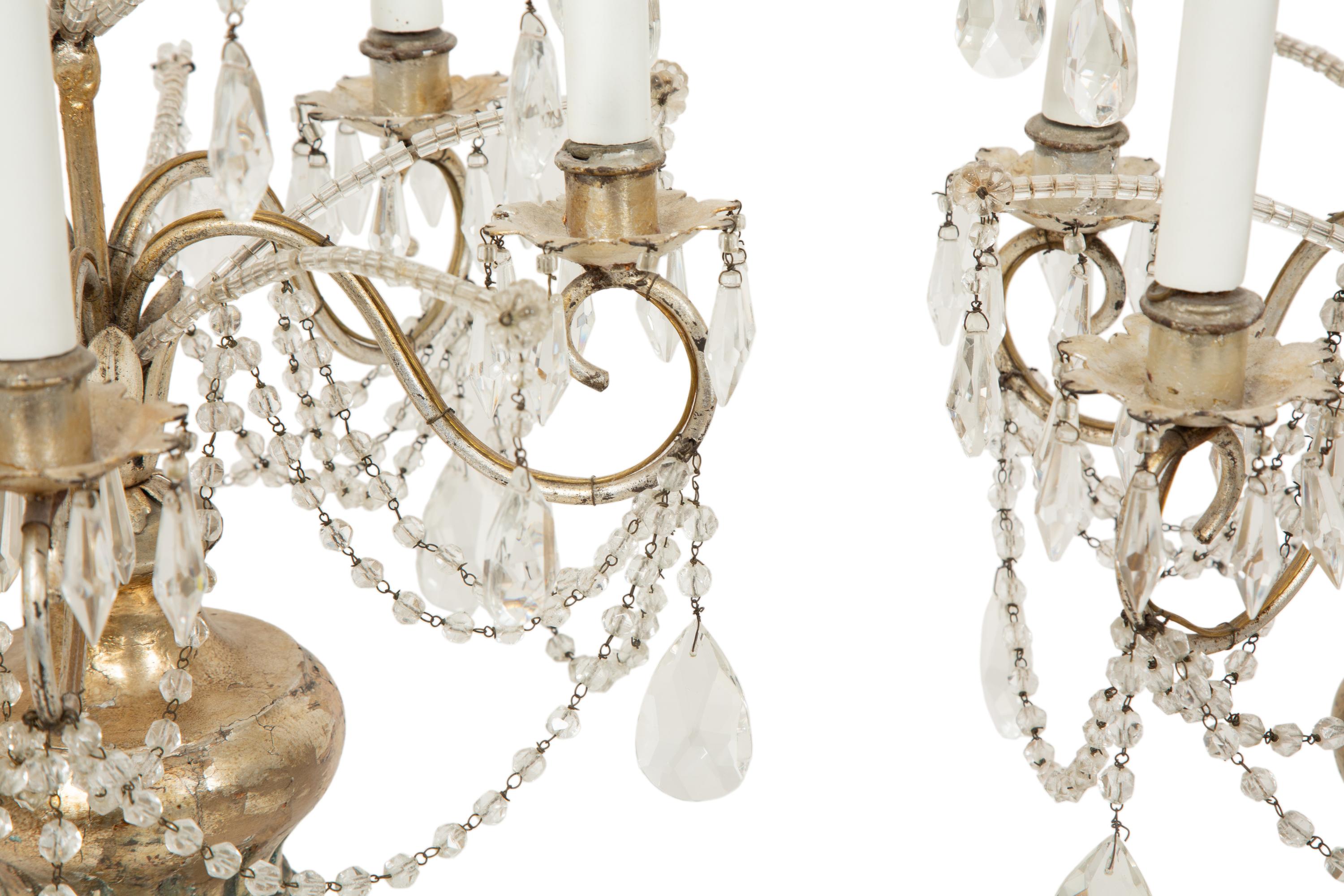 A Pair of Louis XV Style Cut Glass Five-Light Girandoles in Silvered Wood Bases