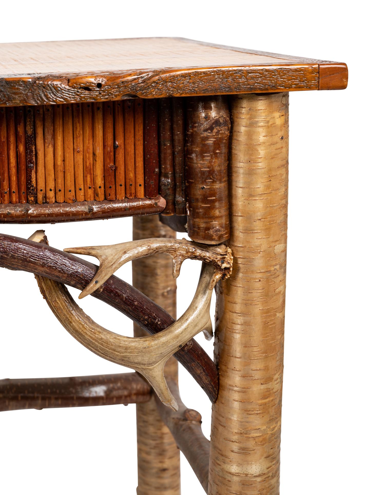 An Adirondack Table with Inset Painting
