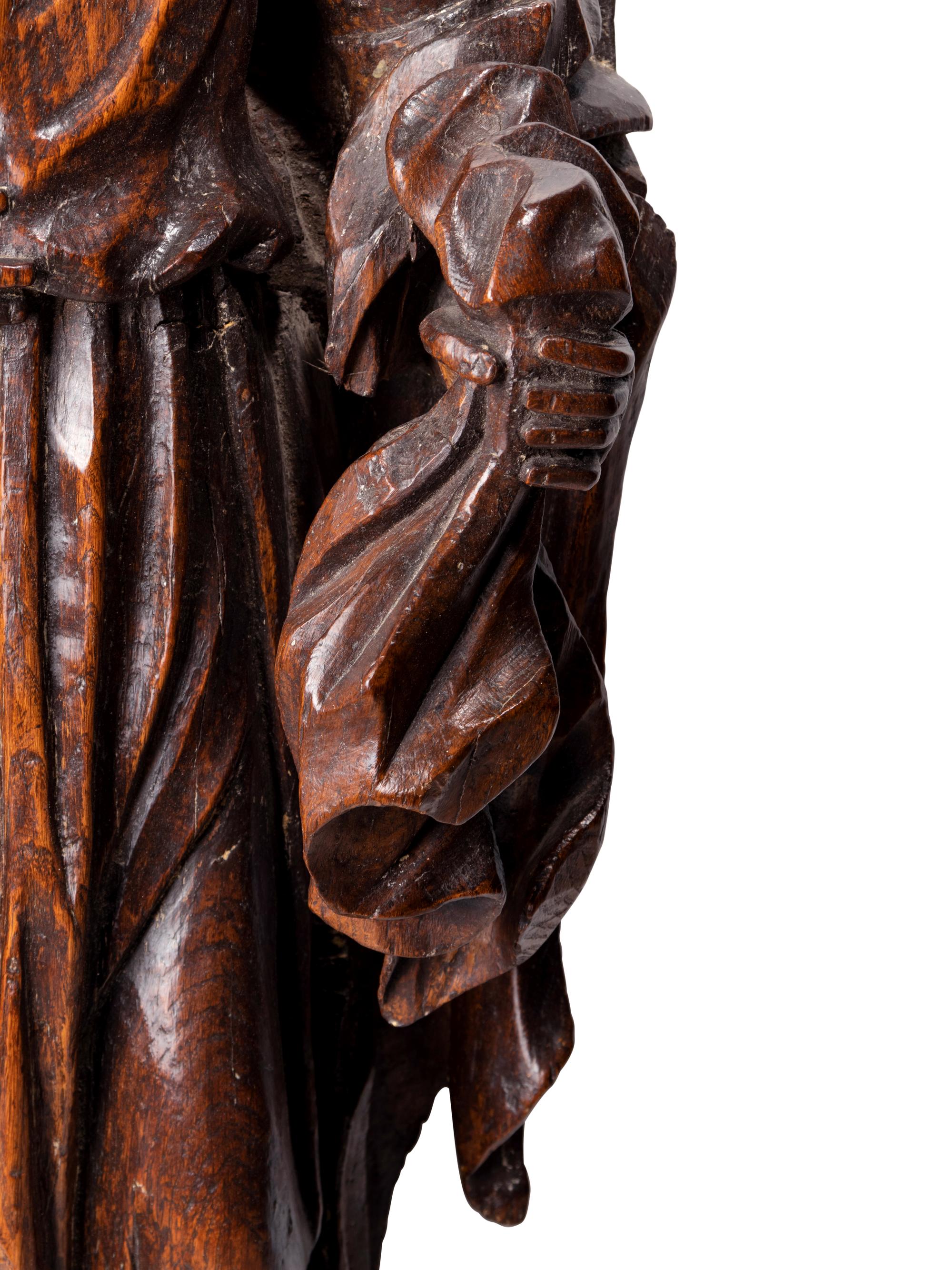 A Continental Carved Wood Figure of a Saint