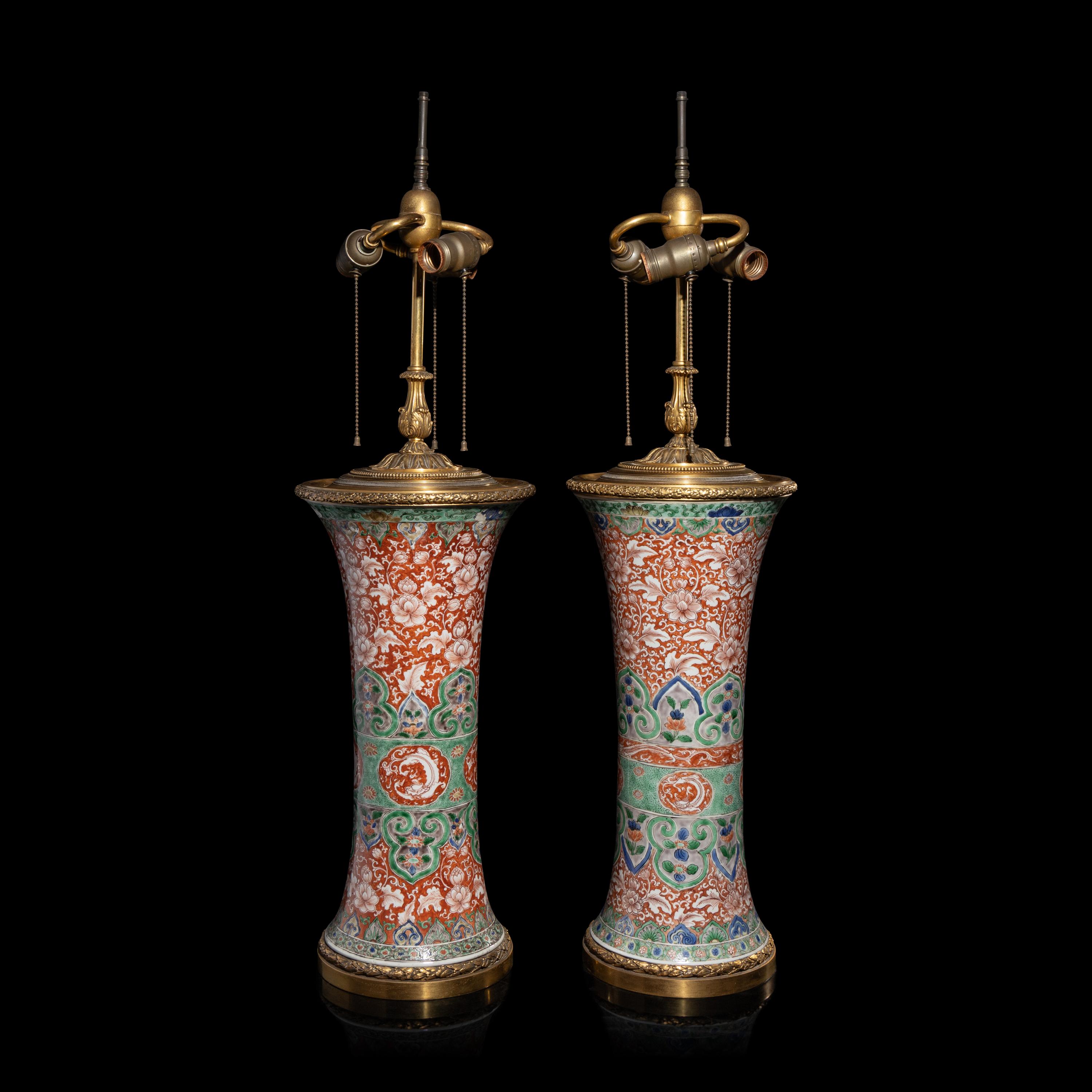An Associated Pair of Chinese Famille Verte 'Flowers' Porcelain Gu Vases, 18th/19th Century — 清中期 五彩纏枝花卉紋觚一對