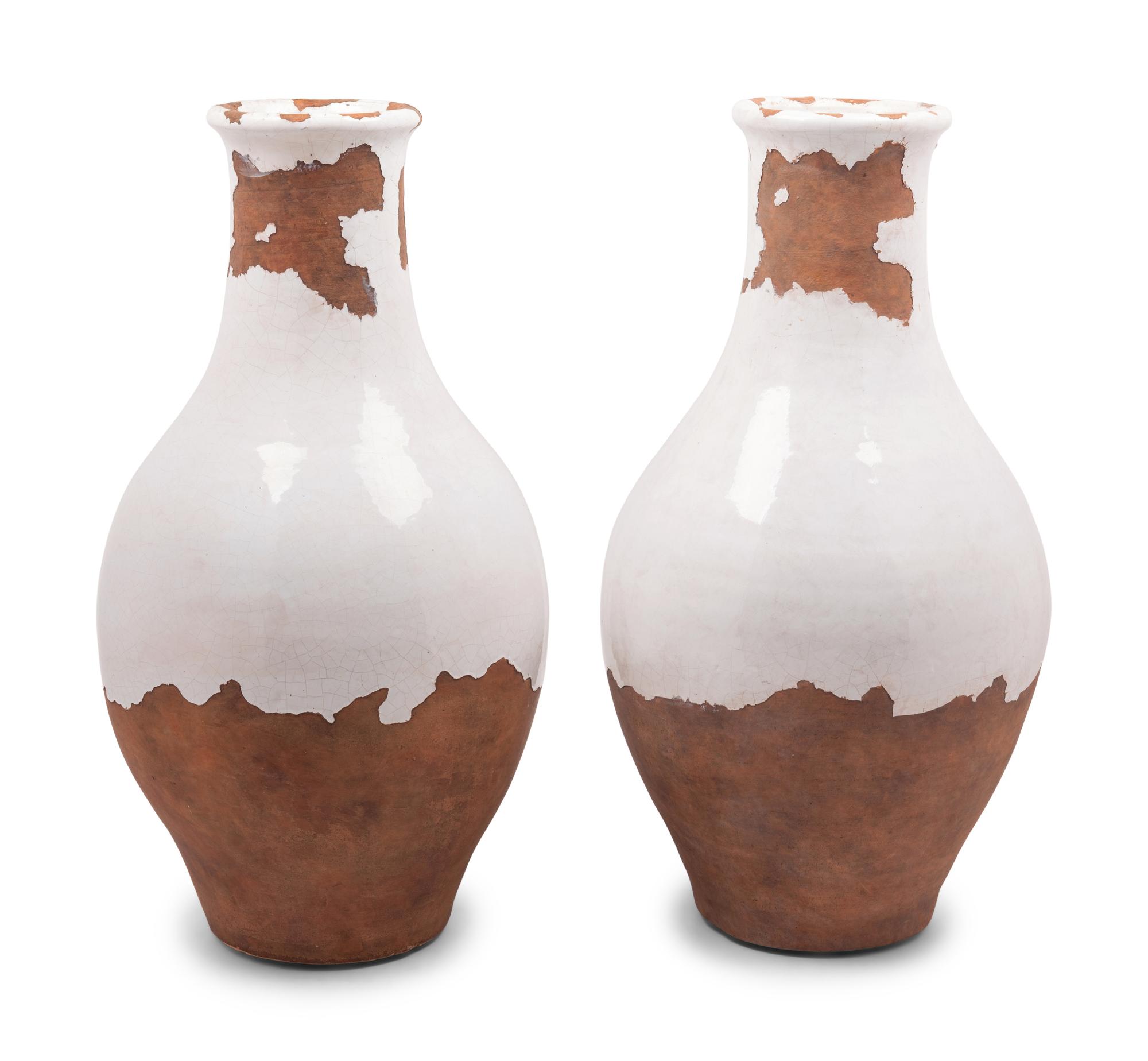 A Pair of French Glazed Terra Cotta Storage Jars