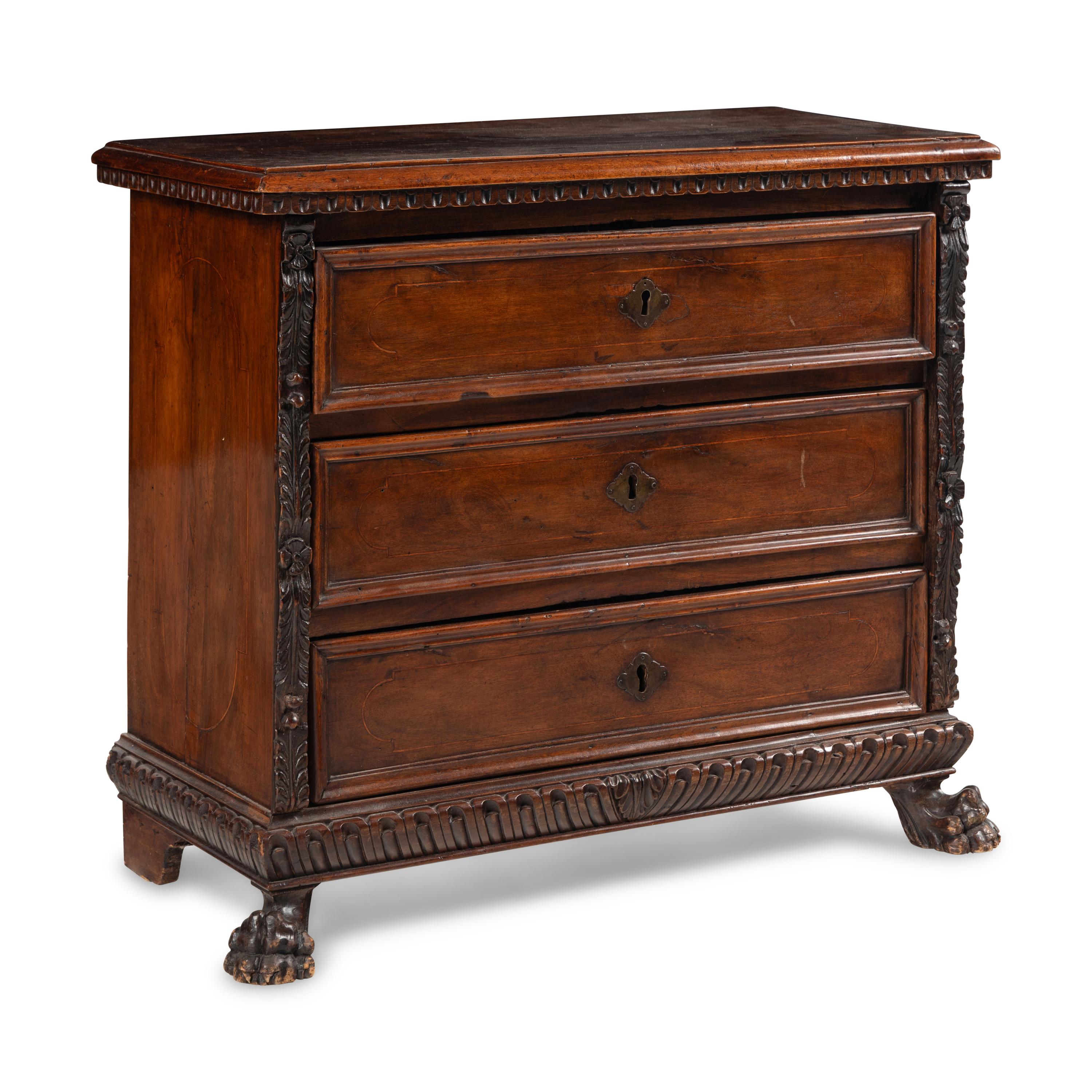 An Italian Baroque Walnut Chest of Drawers