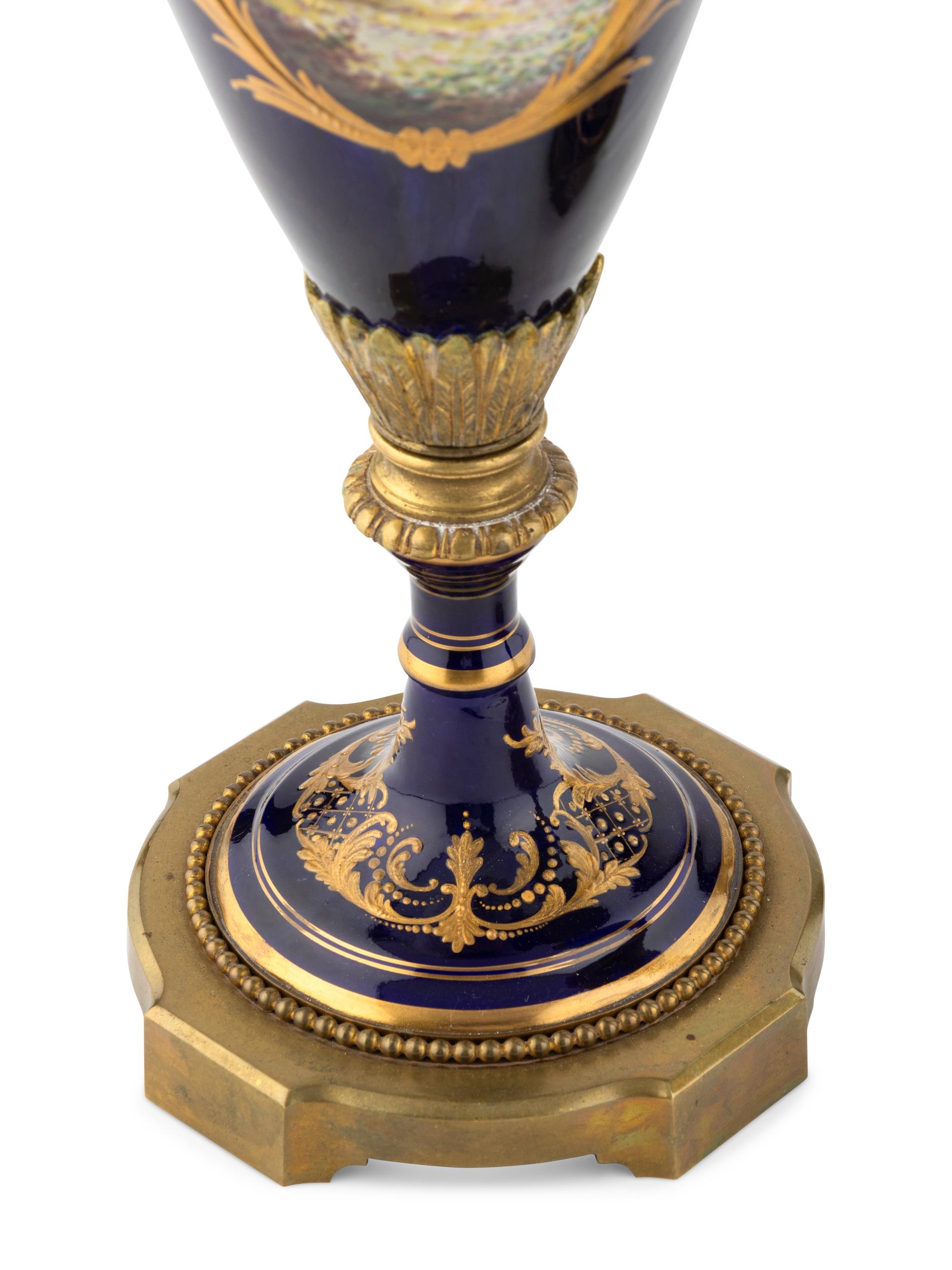 A Pair of Sèvres Style Gilt Metal Mounted Porcelain Vases