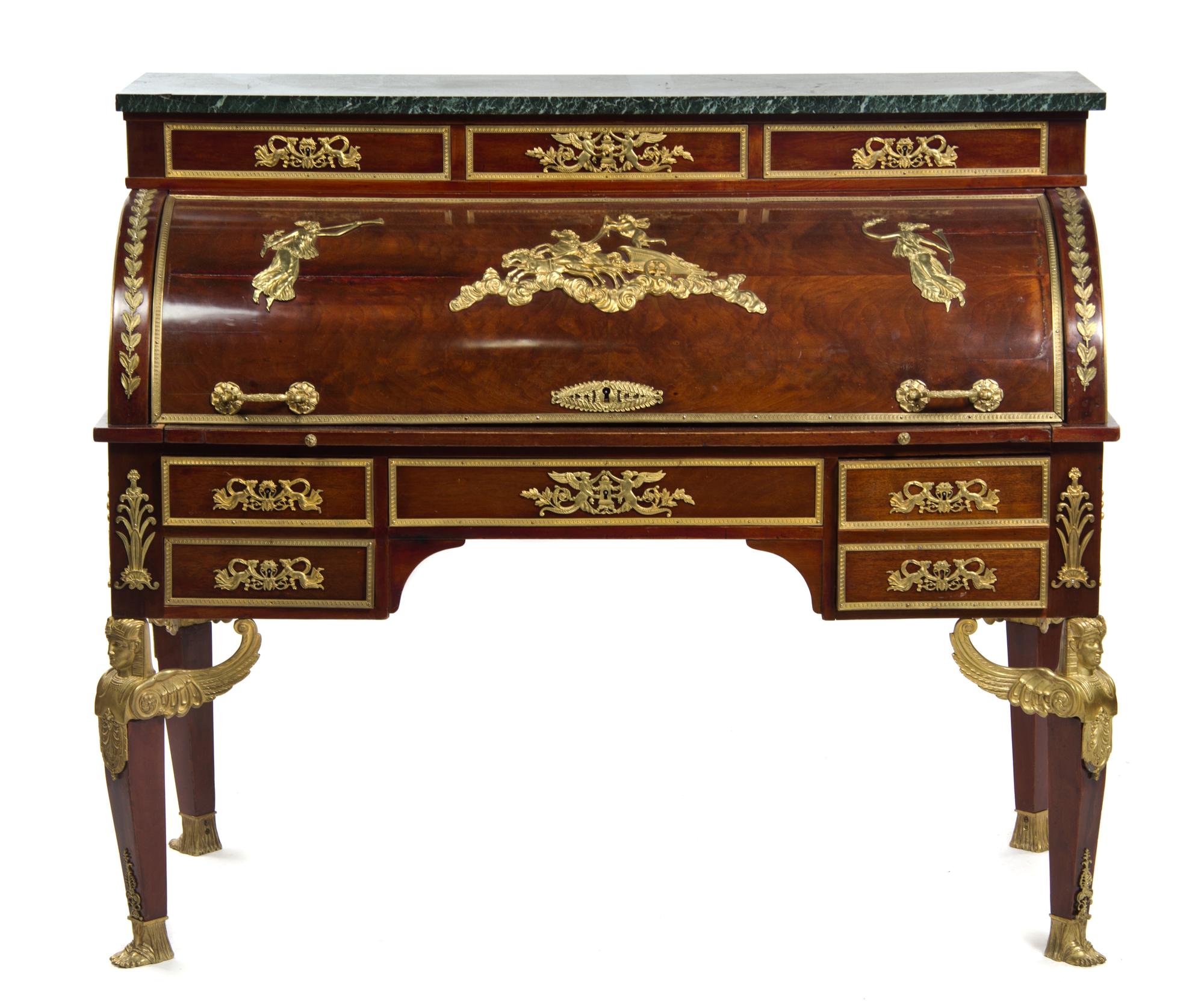 A French Empire Style Gilt Bronze Mounted Mahogany Bureau a Cylindre, LATE 19TH CENTURY, Height 47 x width 55 x depth 25 1/2 inches. — LATE 19TH CENTURY,