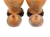 A Pair of Chinese Ochre Ground Famille Rose Porcelain Covered Jars
