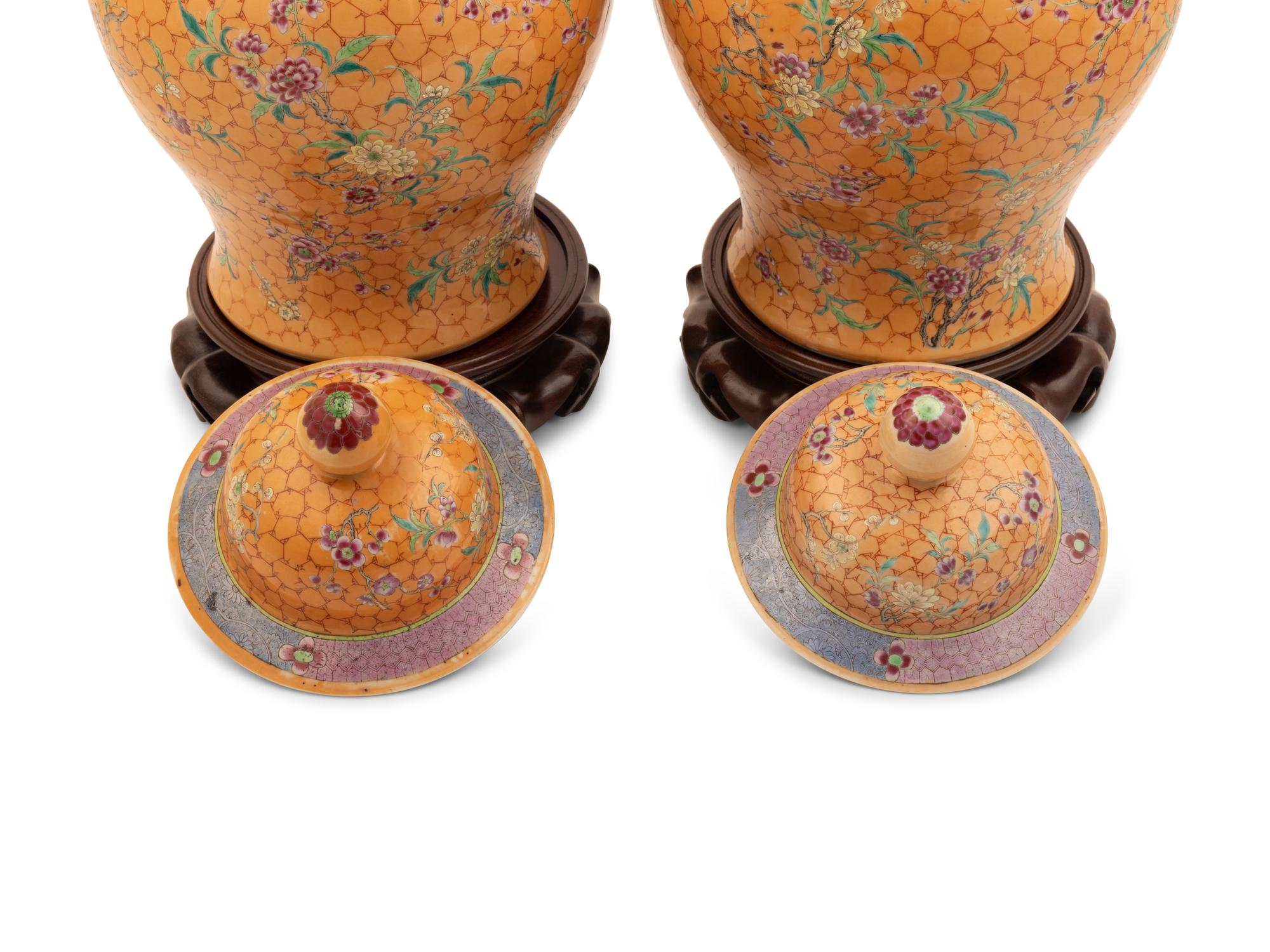 A Pair of Chinese Ochre Ground Famille Rose Porcelain Covered Jars