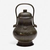 A Chinese archaistic patinated bronze covered wine vessel, you 倣古风格卣 late Ming/Qing dynasty ?????