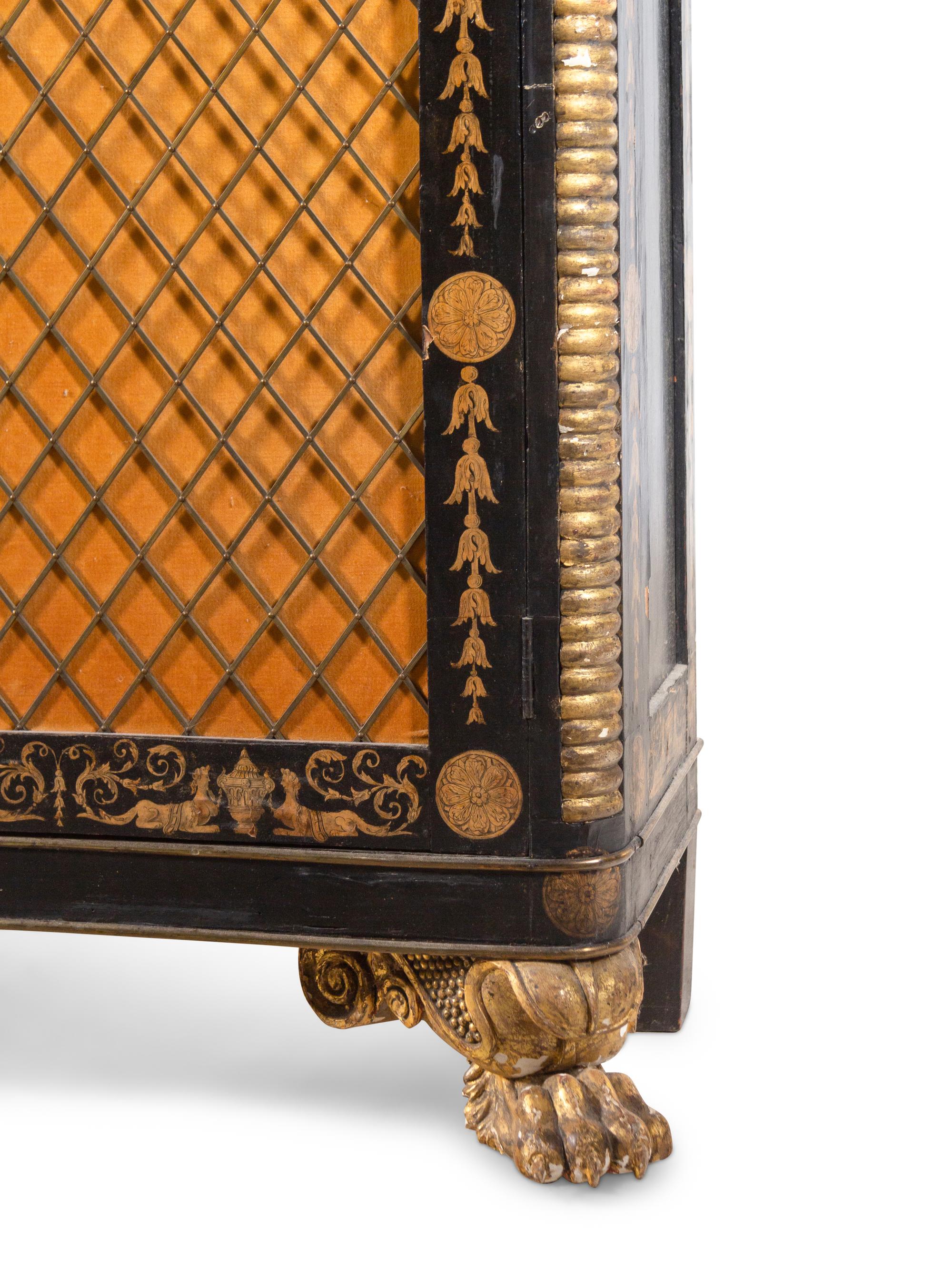 A Regency Style Parcel Gilt and Ebonized Penwork Cabinet