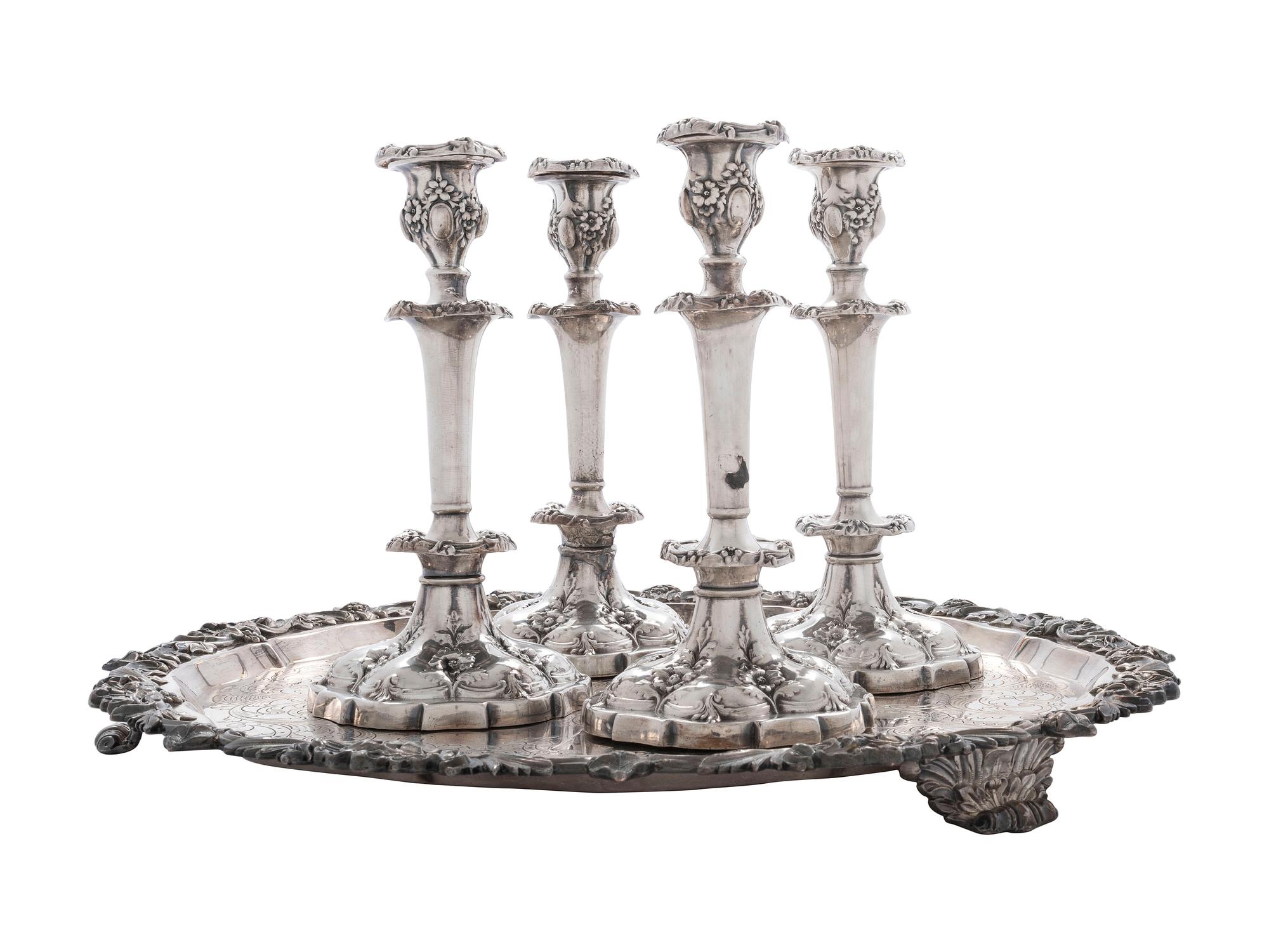 Four Silverplated Weighted Candlesticks and a Silverplated Tray