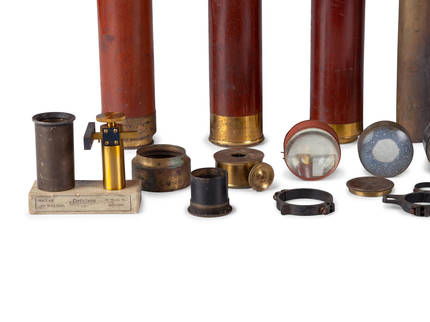 A group of 25 items, highlighted by handheld telescopes, found in the workshop of George W. Fitz, Peconic, New York.