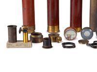 A group of 25 items, highlighted by handheld telescopes, found in the workshop of George W. Fitz, Peconic, New York.