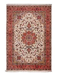 A Tabriz Silk and Wool Rug