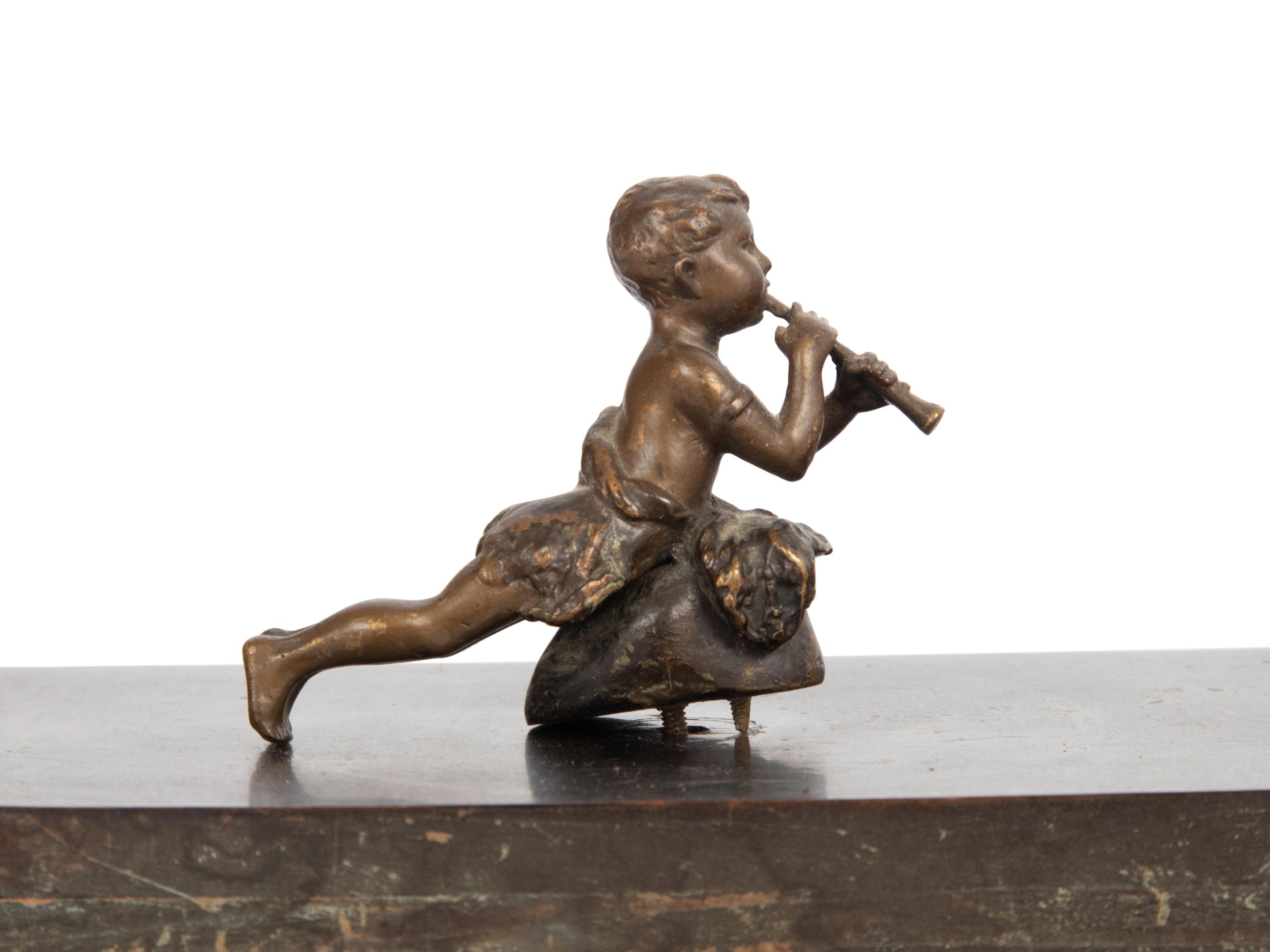 An Empire Style Gilt Metal and Alabaster Mounted Ebonized Clock